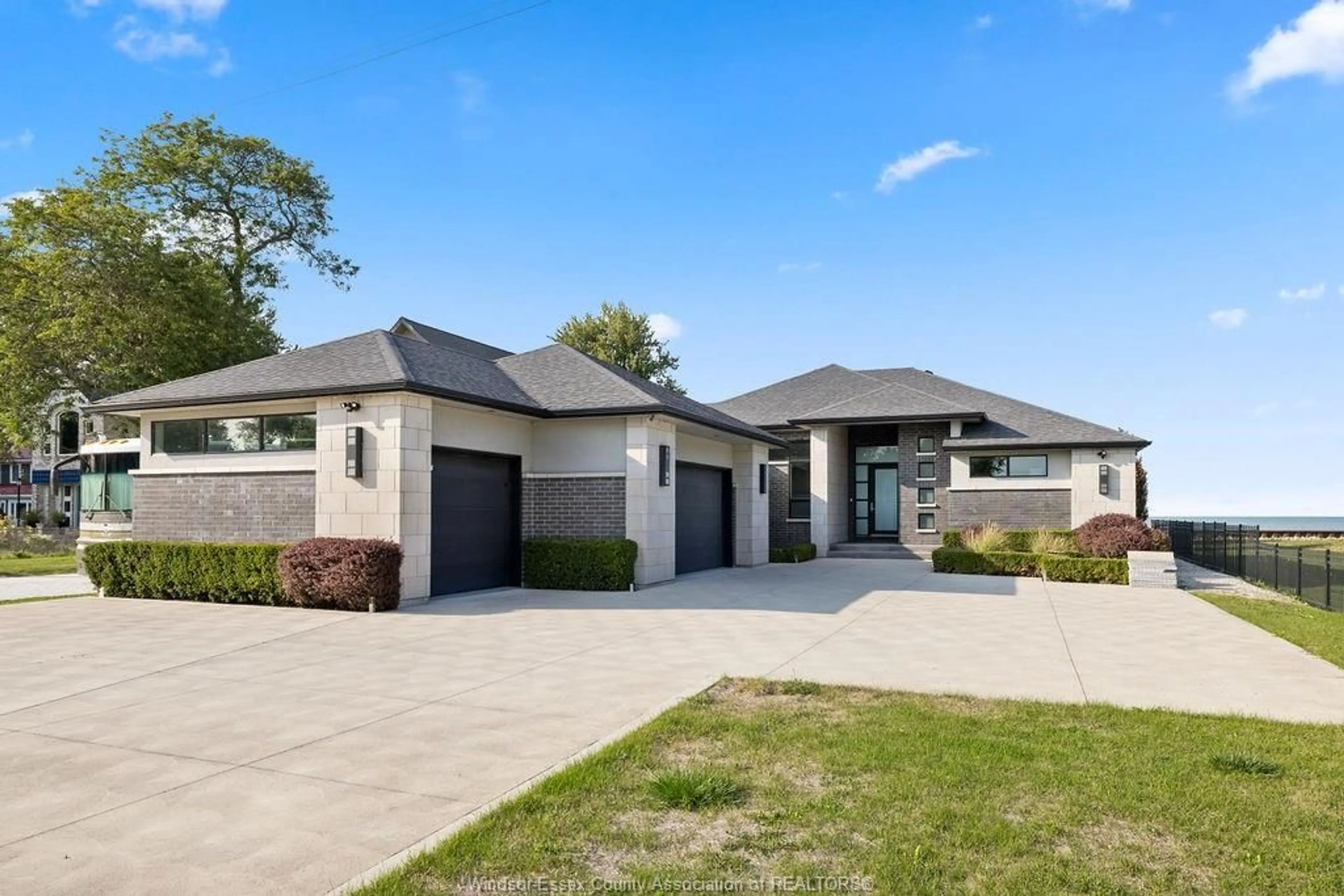 Home with brick exterior material, street for 371 CHARRON BEACH, Lakeshore Ontario N8L 0G2