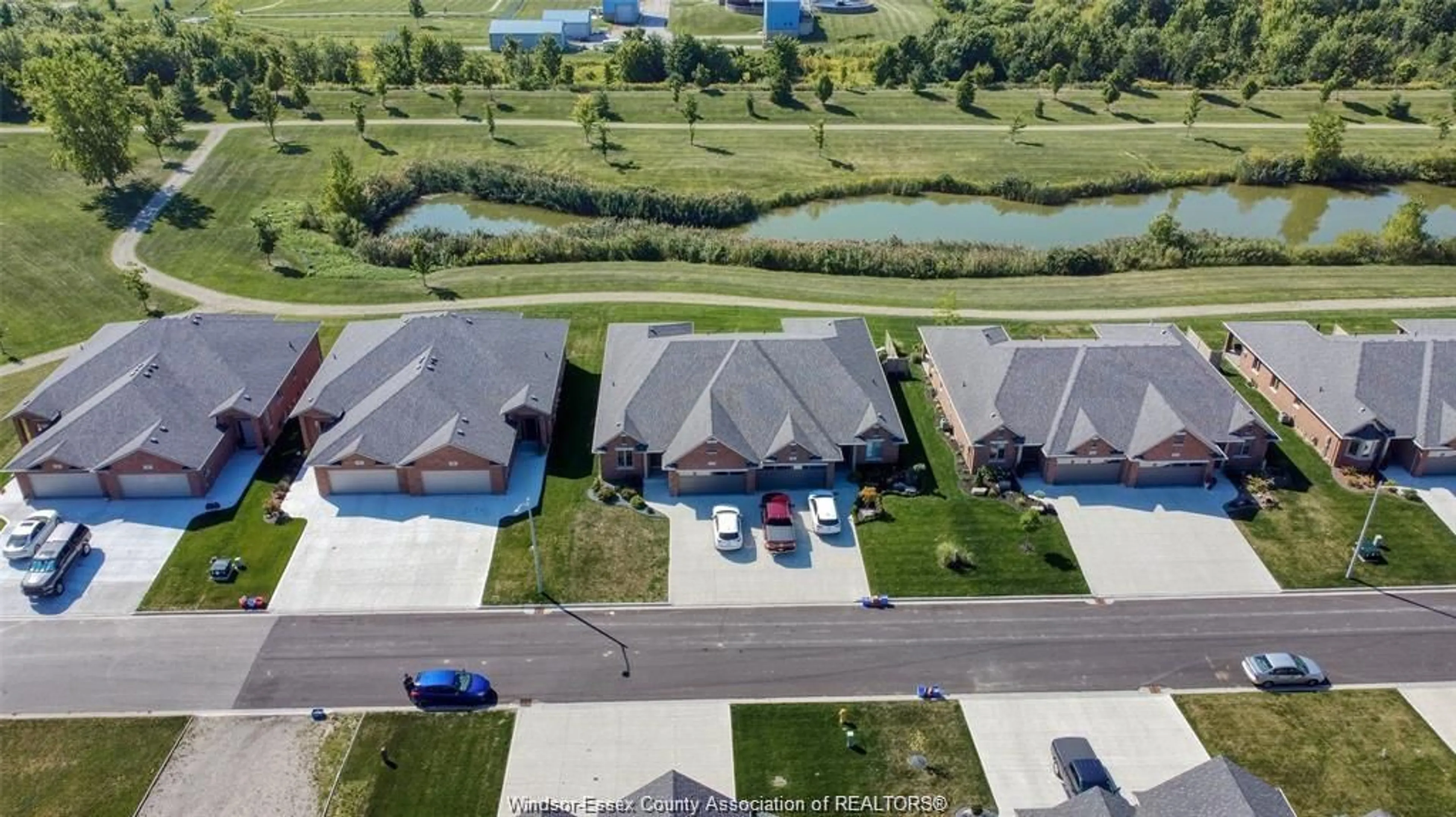 A pic from outside/outdoor area/front of a property/back of a property/a pic from drone, water/lake/river/ocean view for 66 YORK Blvd, Kingsville Ontario N9Y 0G3
