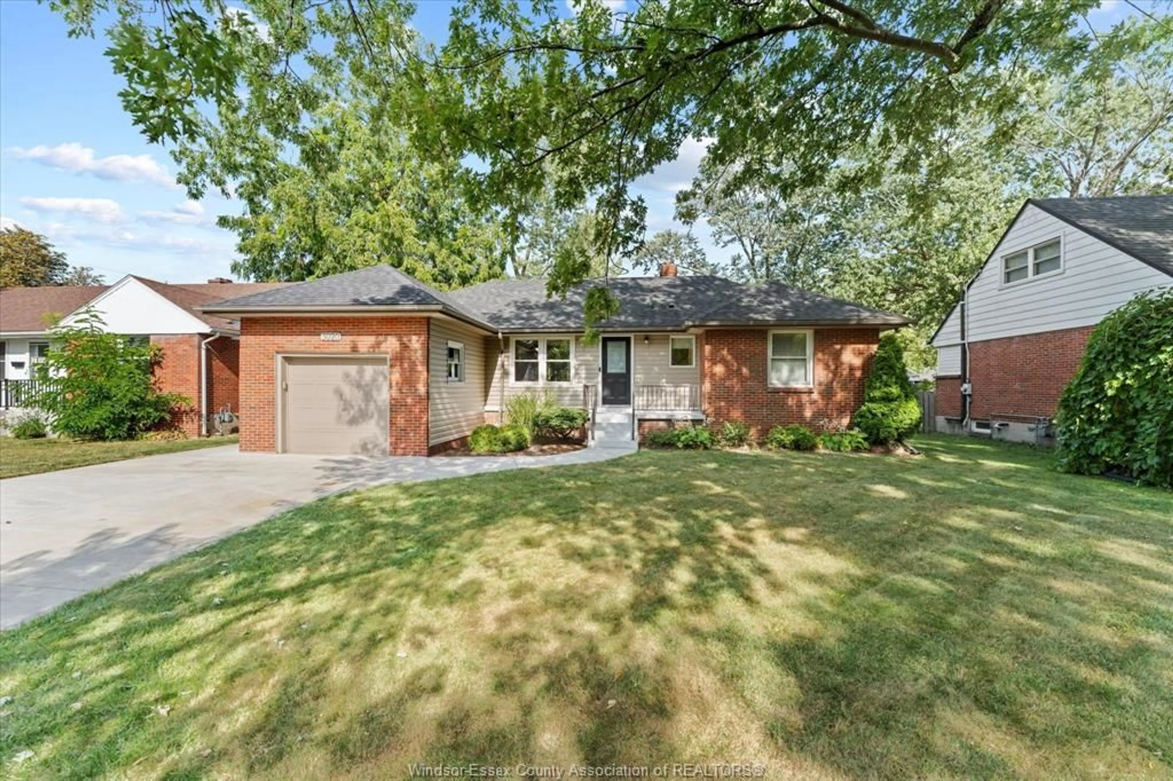 Home with brick exterior material, street for 3020 ACADEMY Dr, Windsor Ontario N9E 2H4