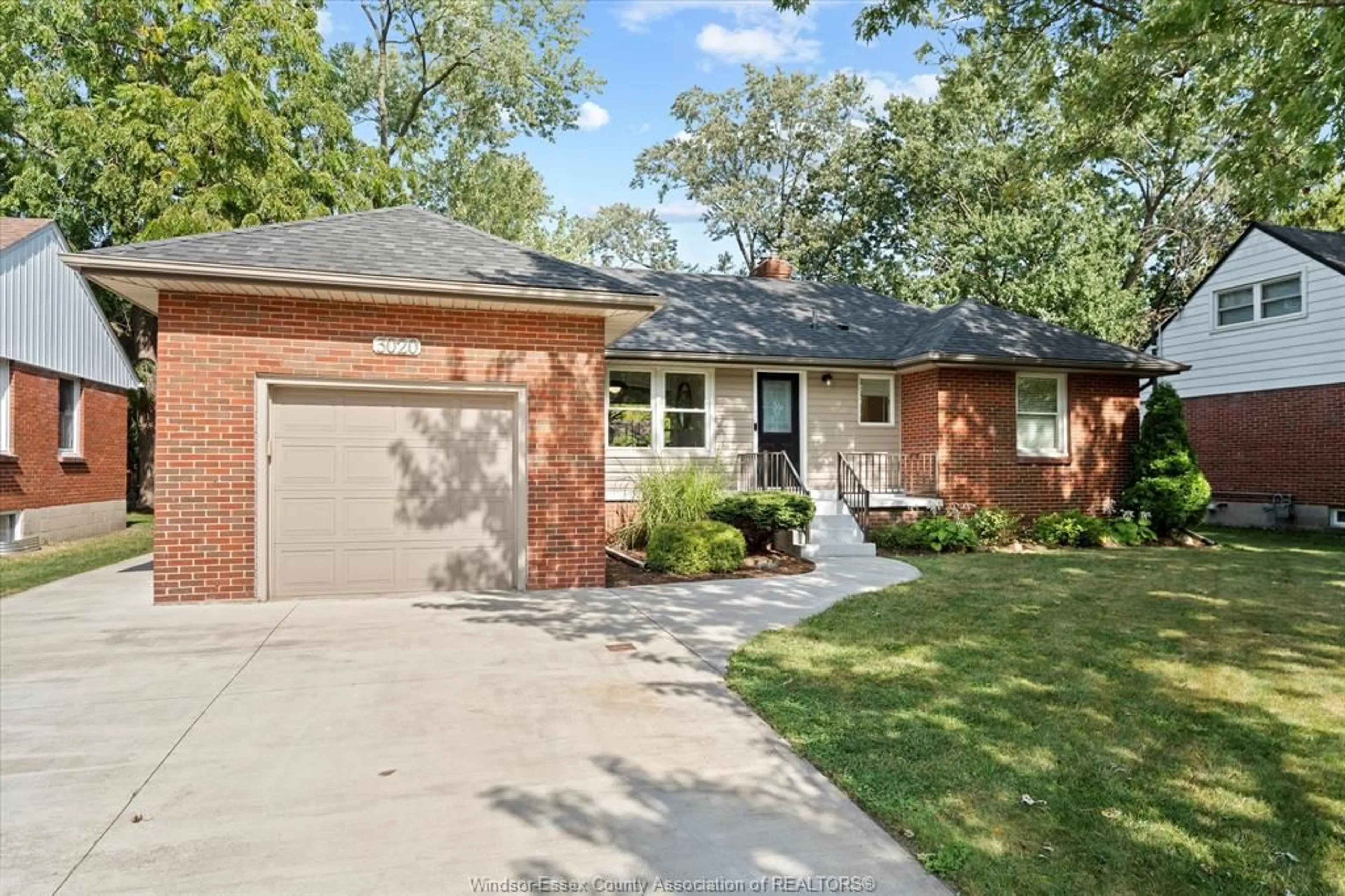 Home with brick exterior material, street for 3020 ACADEMY Dr, Windsor Ontario N9E 2H4