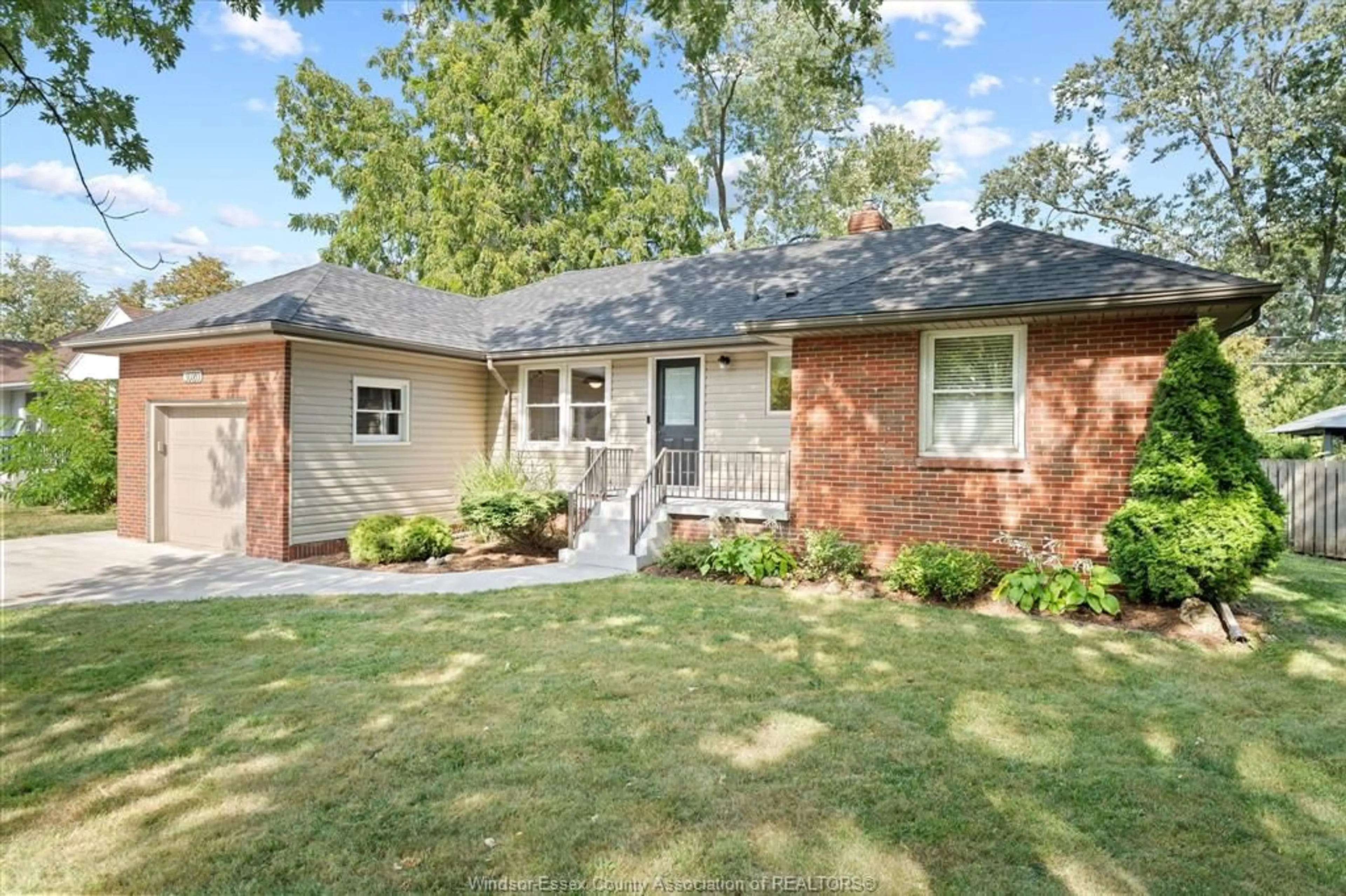 Home with brick exterior material, street for 3020 ACADEMY Dr, Windsor Ontario N9E 2H4