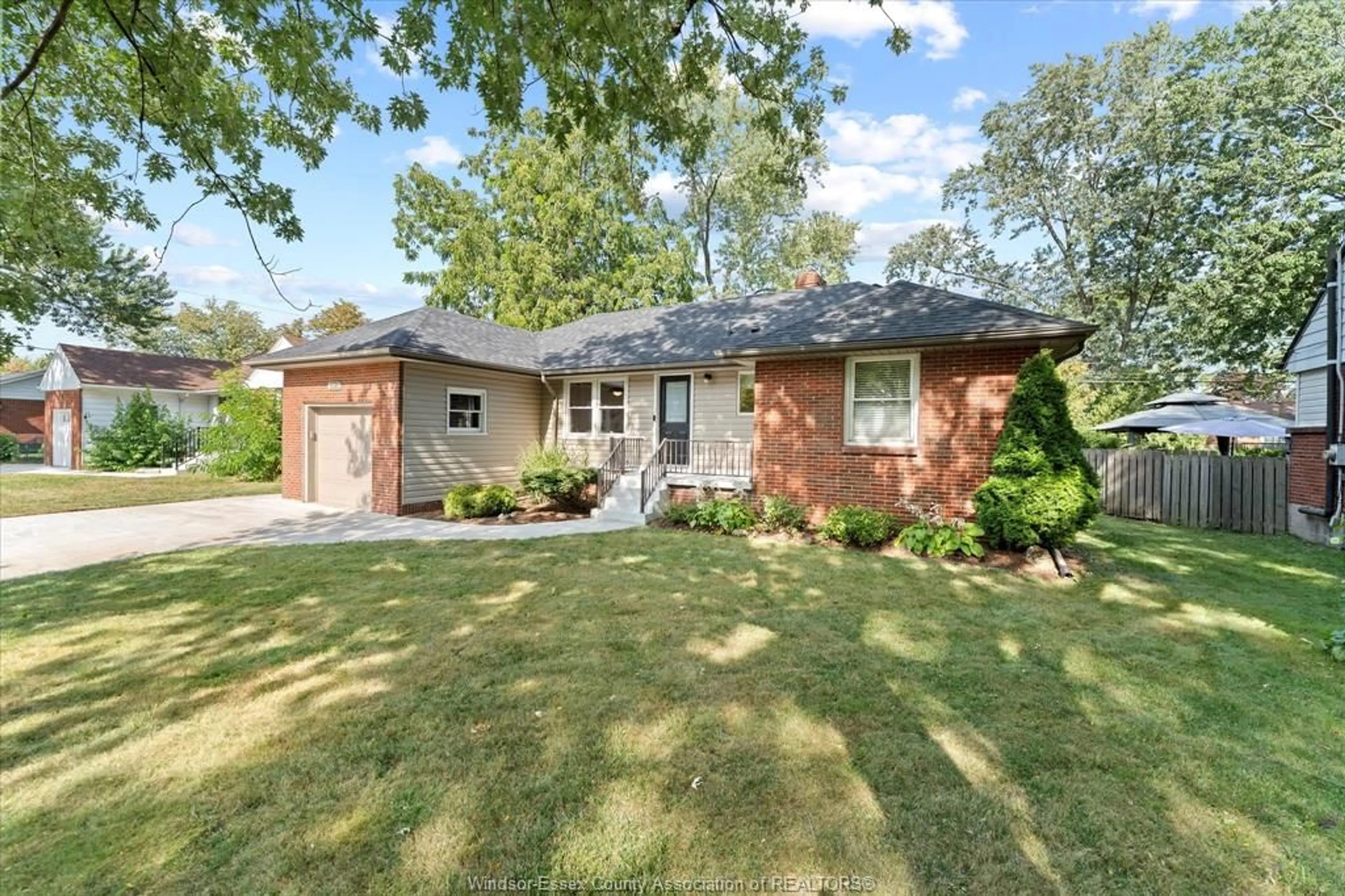 Home with brick exterior material, street for 3020 ACADEMY Dr, Windsor Ontario N9E 2H4