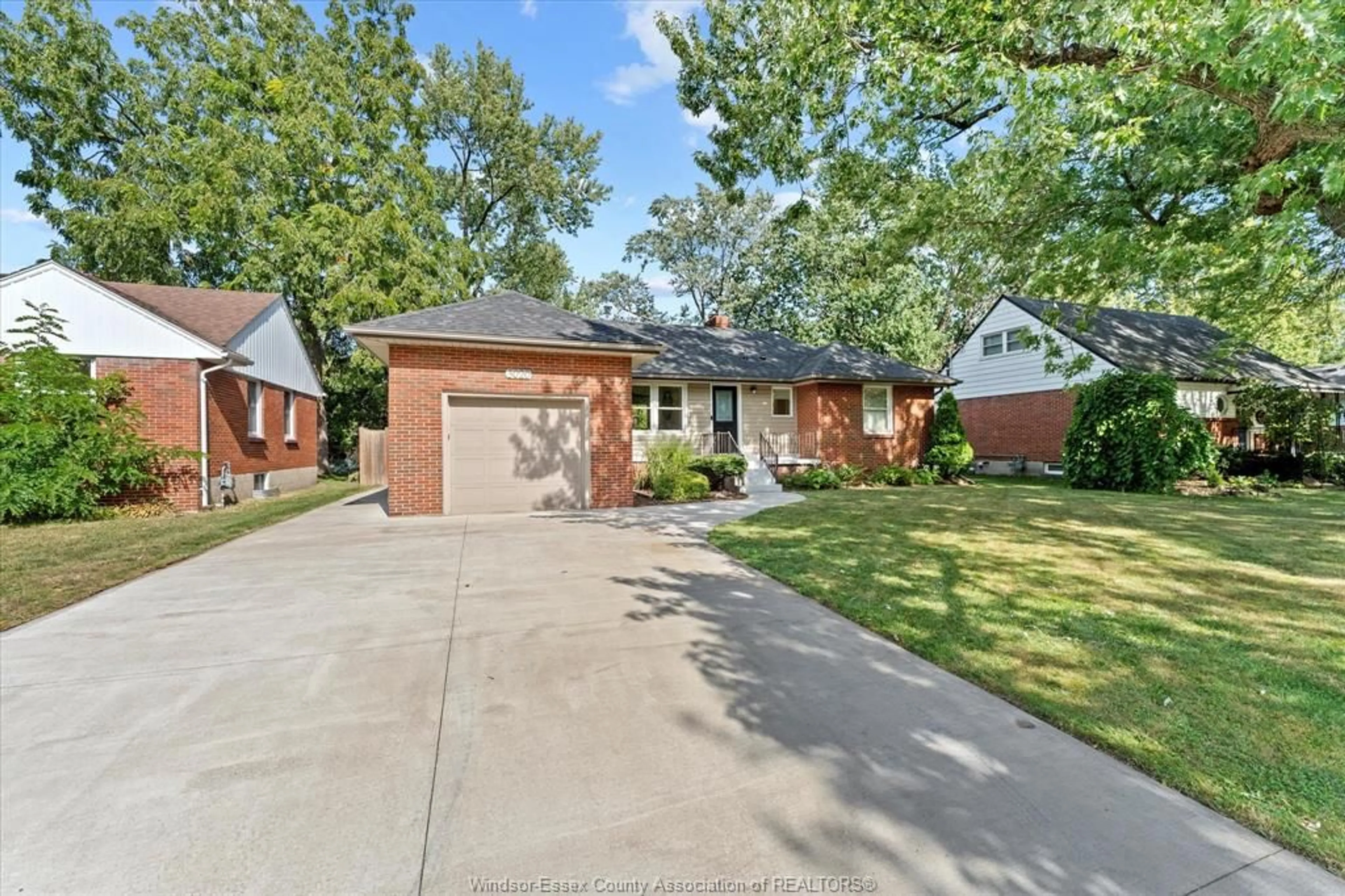 Home with brick exterior material, street for 3020 ACADEMY Dr, Windsor Ontario N9E 2H4