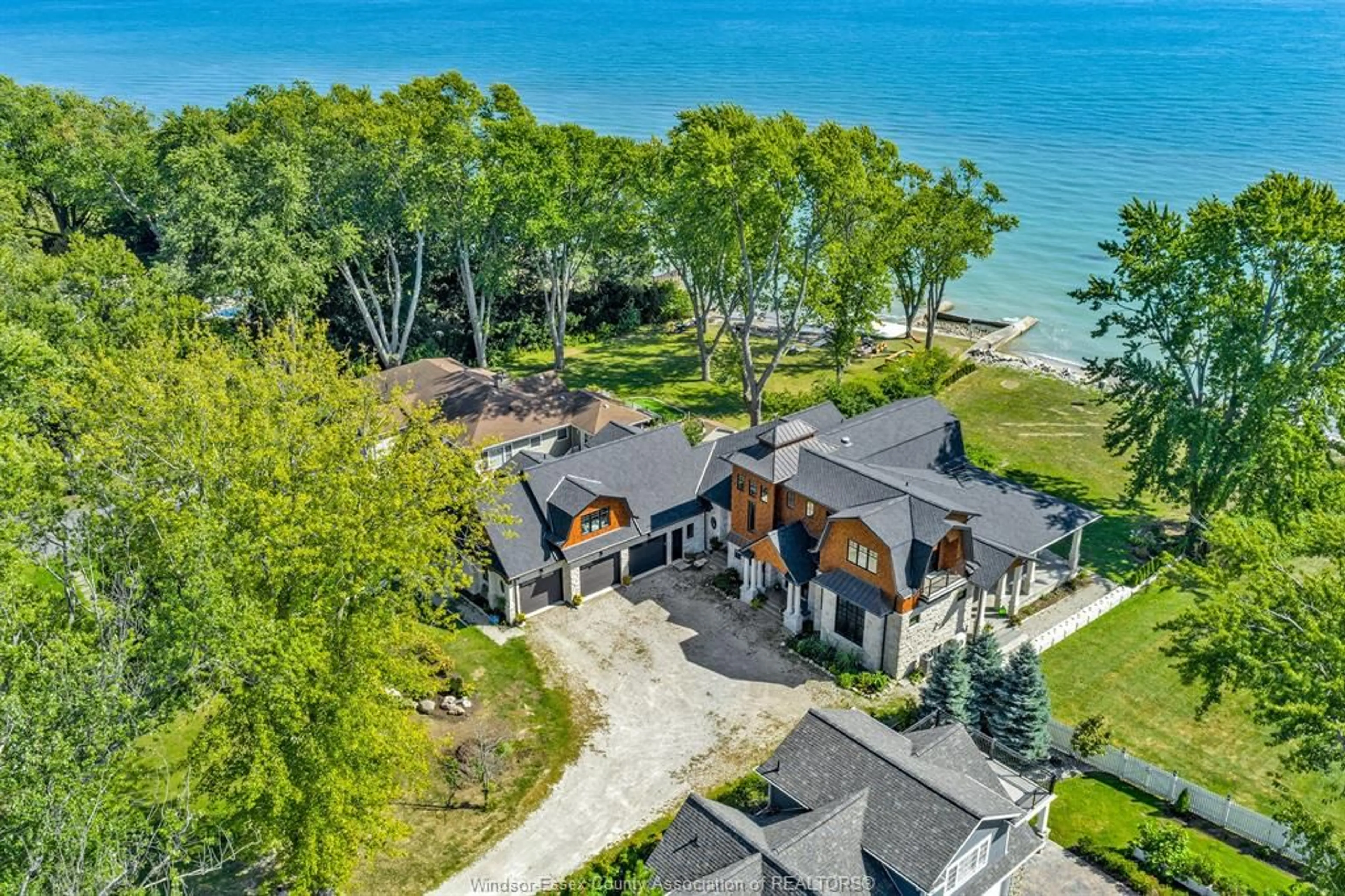A pic from outside/outdoor area/front of a property/back of a property/a pic from drone, water/lake/river/ocean view for 1913 HERITAGE Rd, Kingsville Ontario N9Y 2E6