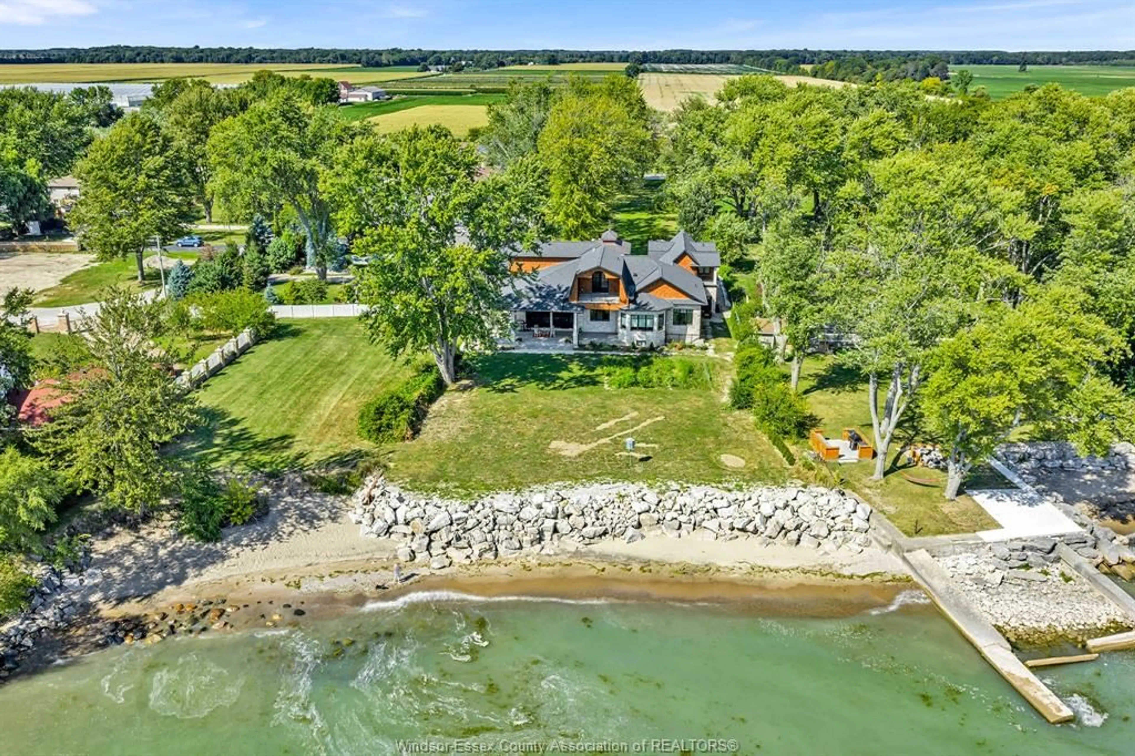 A pic from outside/outdoor area/front of a property/back of a property/a pic from drone, water/lake/river/ocean view for 1913 HERITAGE Rd, Kingsville Ontario N9Y 2E6