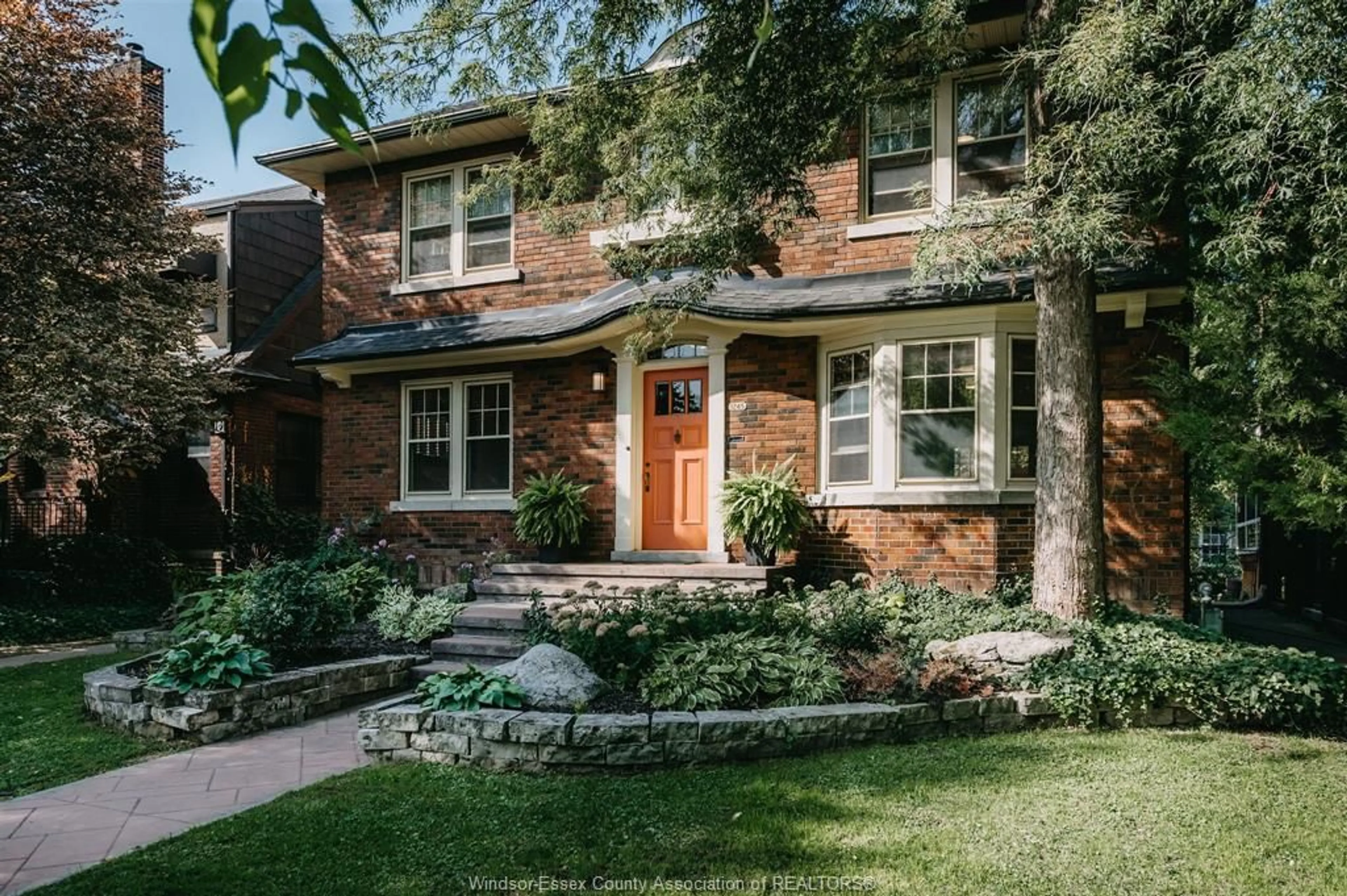 Home with brick exterior material, street for 1245 Kildare Rd, Windsor Ontario N8Y 3H7