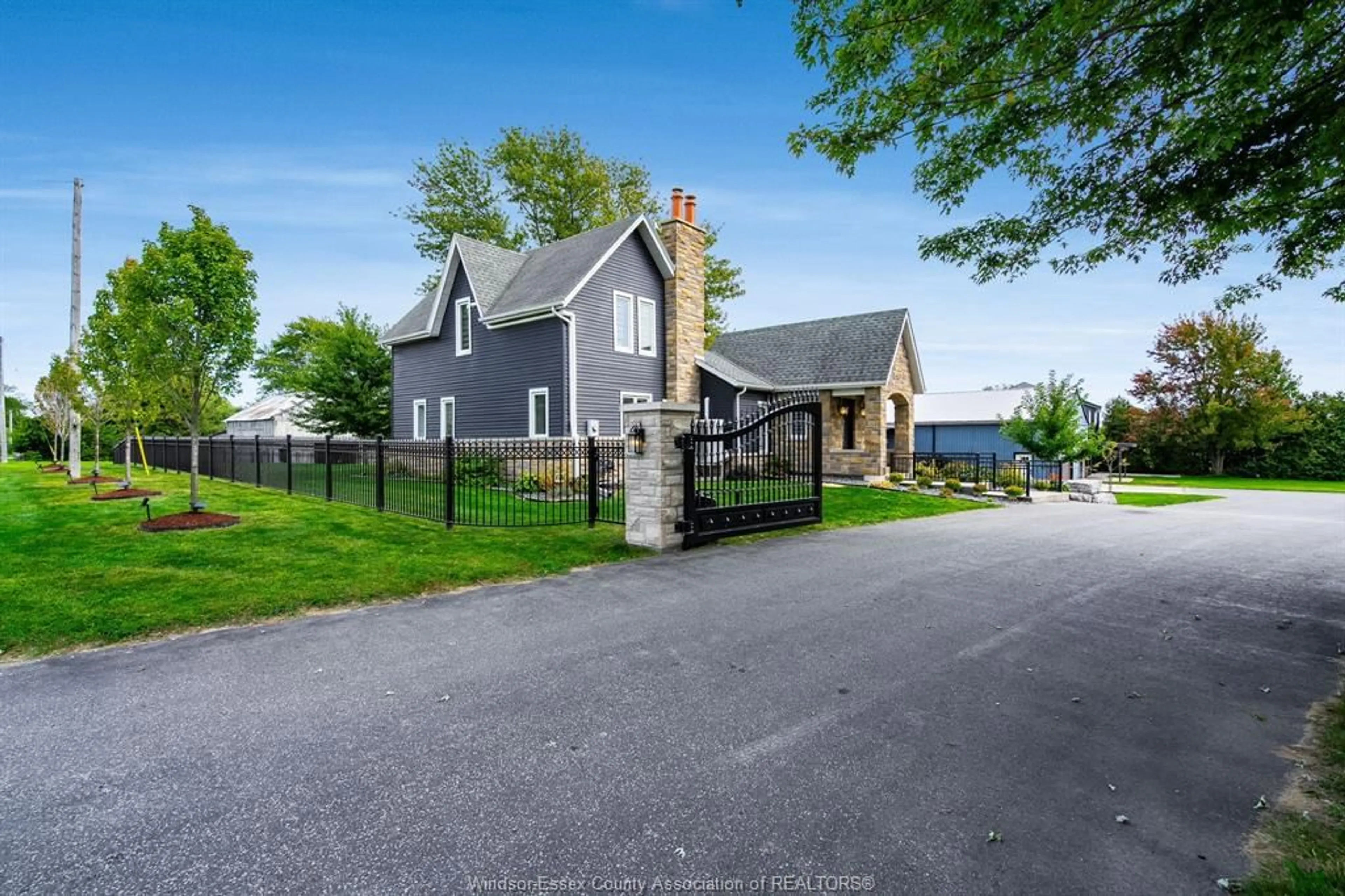 A pic from outside/outdoor area/front of a property/back of a property/a pic from drone, street for 702 Talbot Rd, Wheatley Ontario N0P 2P0