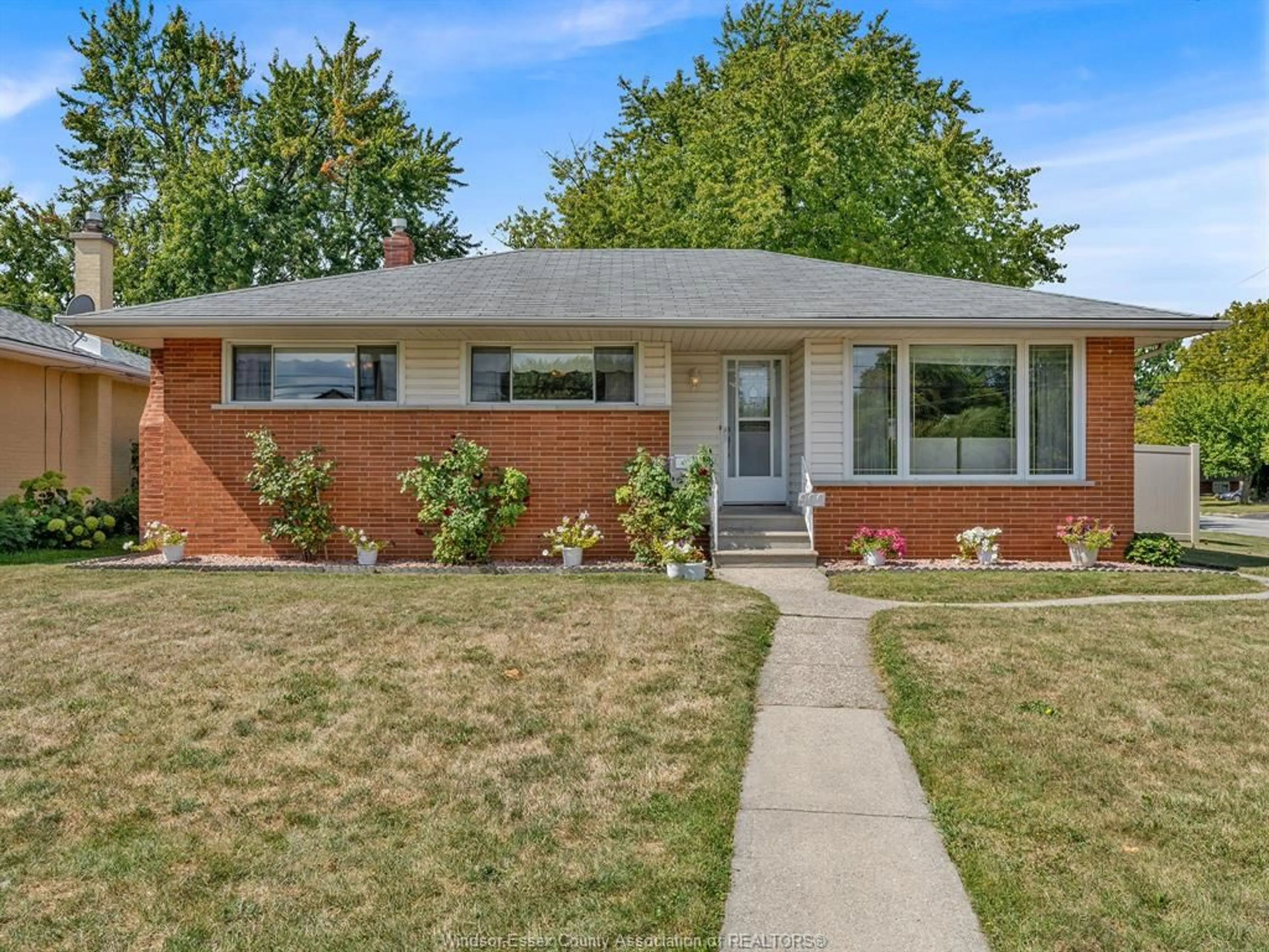 Home with brick exterior material, street for 909 RIVERDALE, Windsor Ontario N8S 4C4