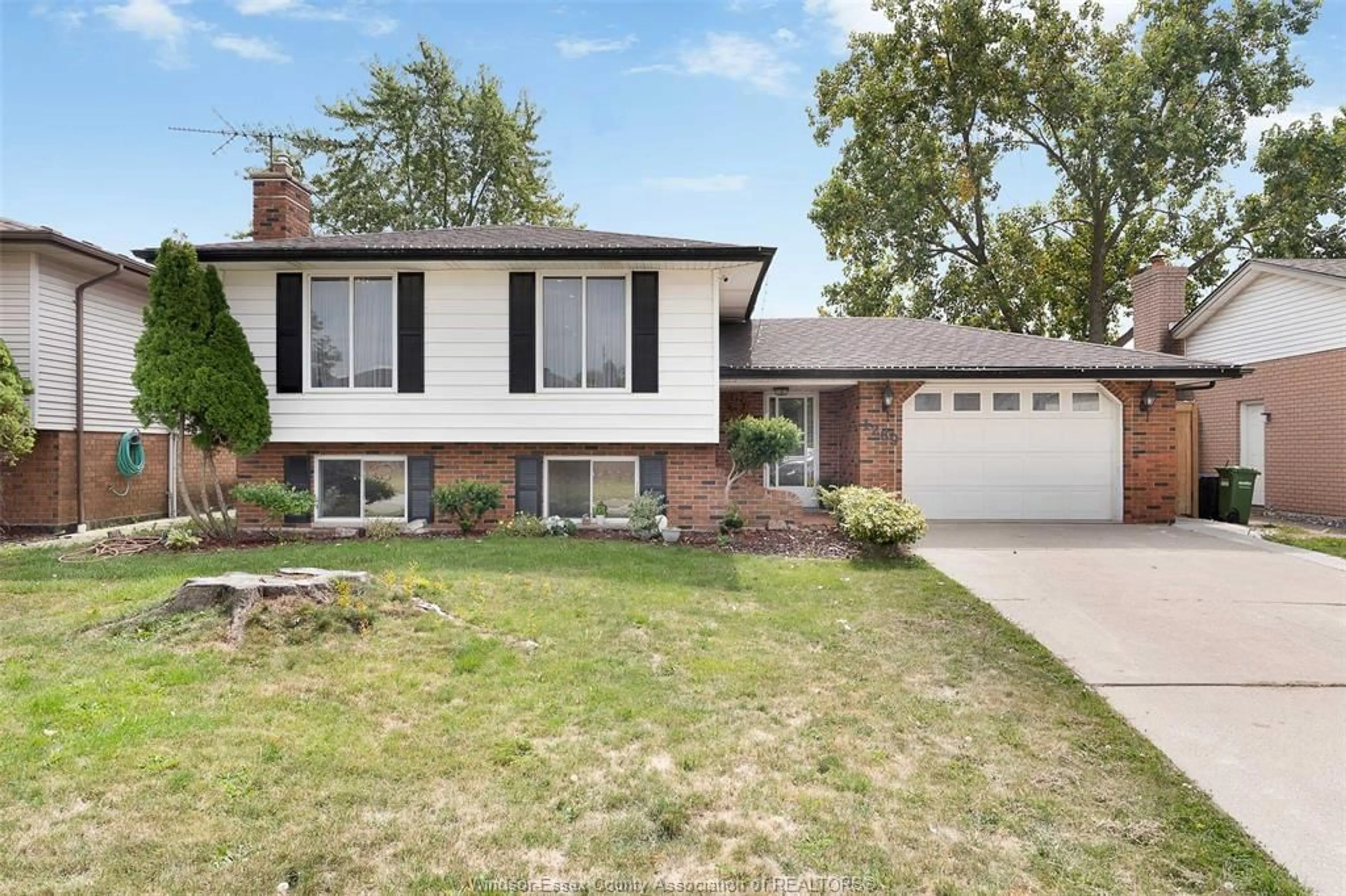 Home with brick exterior material, street for 1289 CARRIAGE Lane, LaSalle Ontario N9H 1Z7
