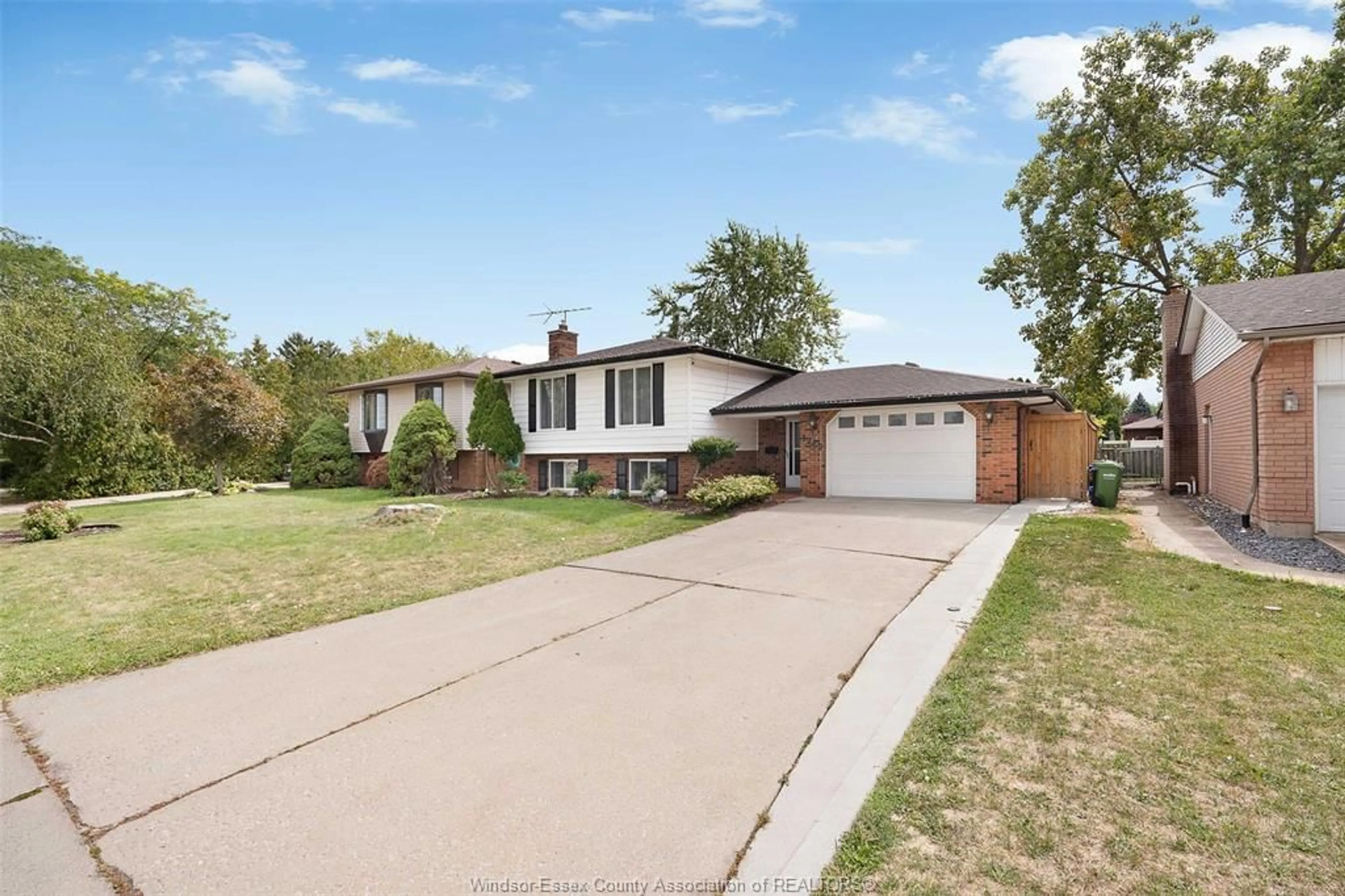 Home with brick exterior material, street for 1289 CARRIAGE Lane, LaSalle Ontario N9H 1Z7