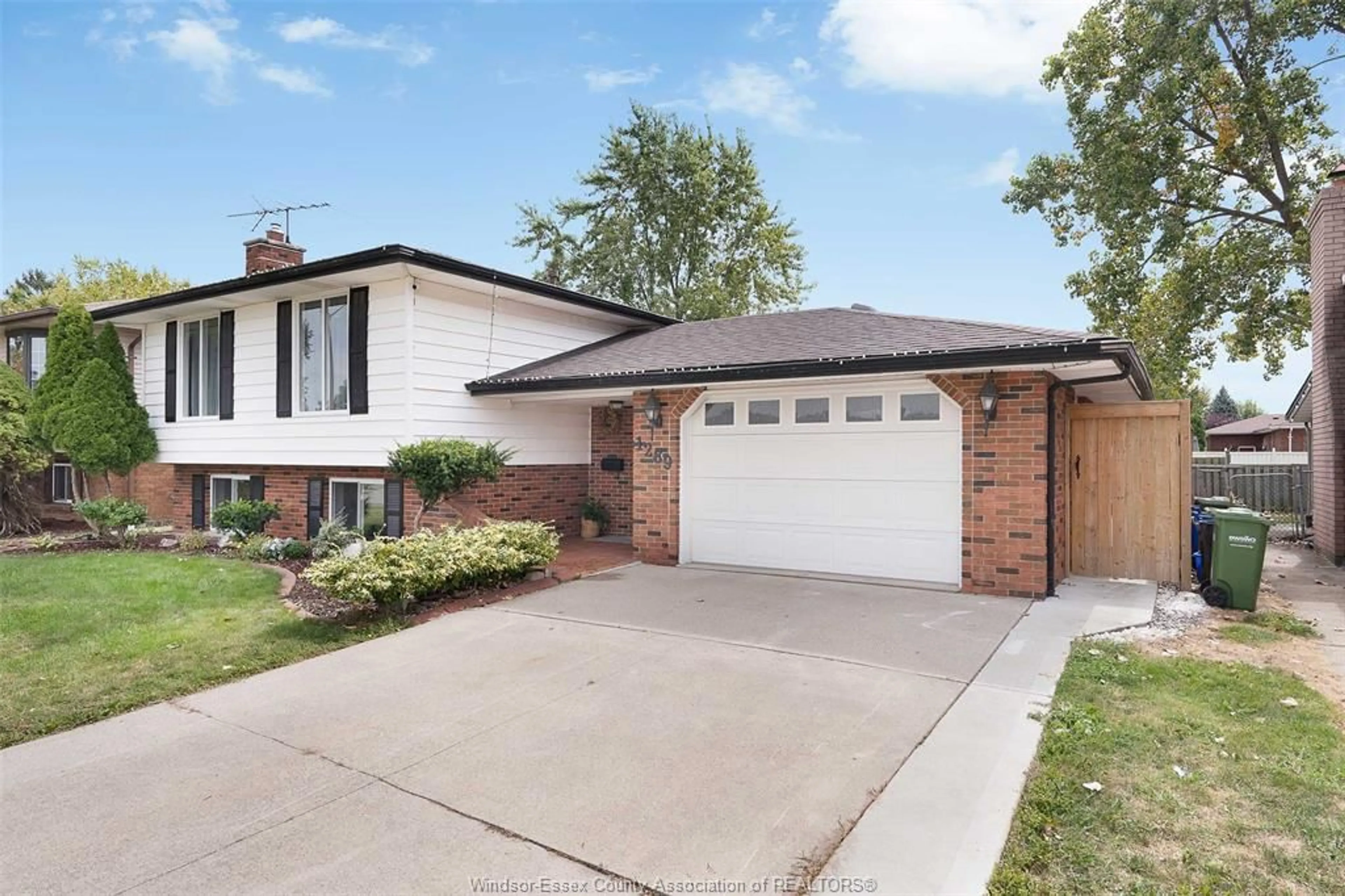 Home with brick exterior material, street for 1289 CARRIAGE Lane, LaSalle Ontario N9H 1Z7