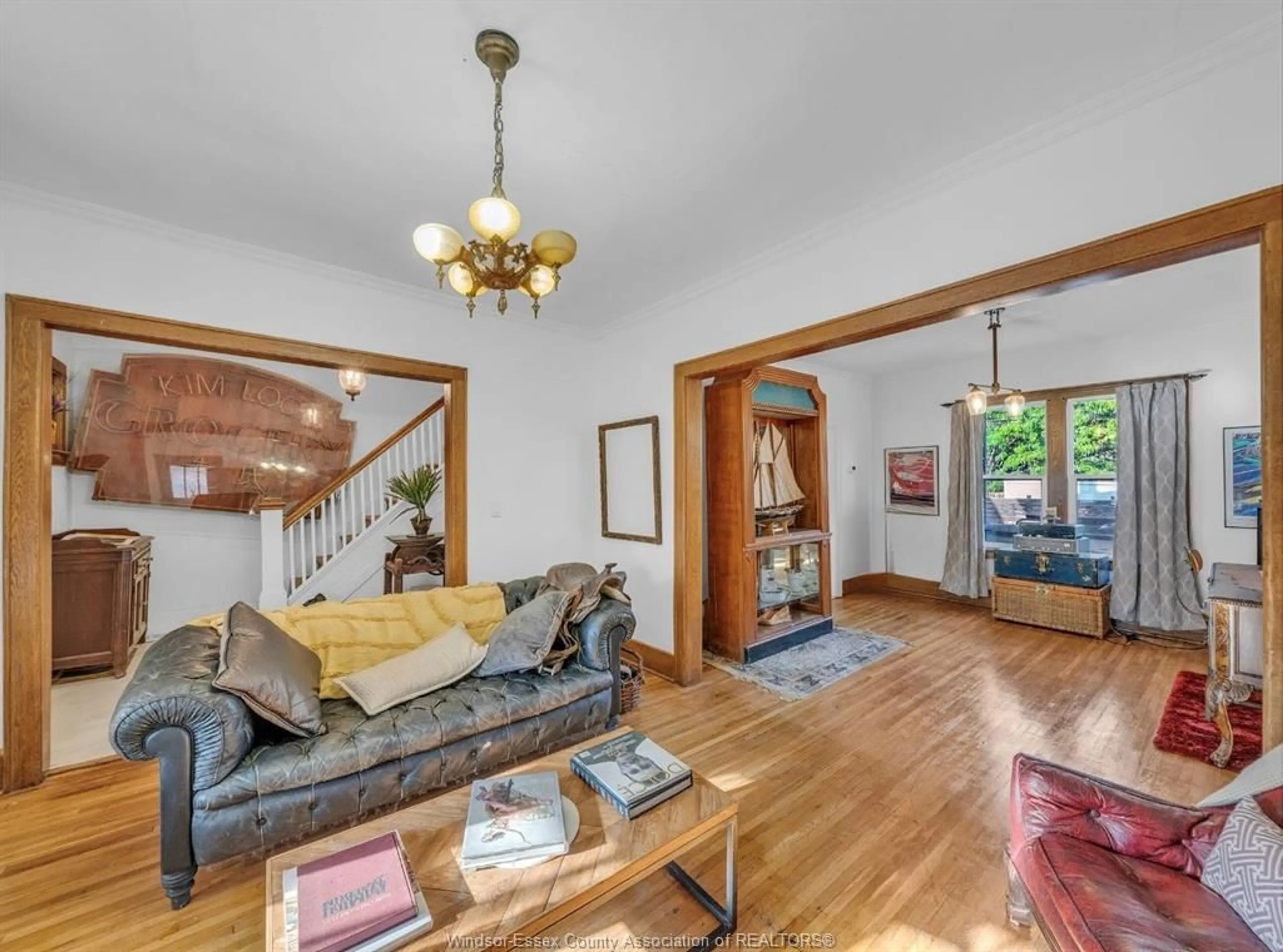 Living room with furniture, wood/laminate floor for 1232 WINDERMERE Rd, Windsor Ontario N8Y 3E8