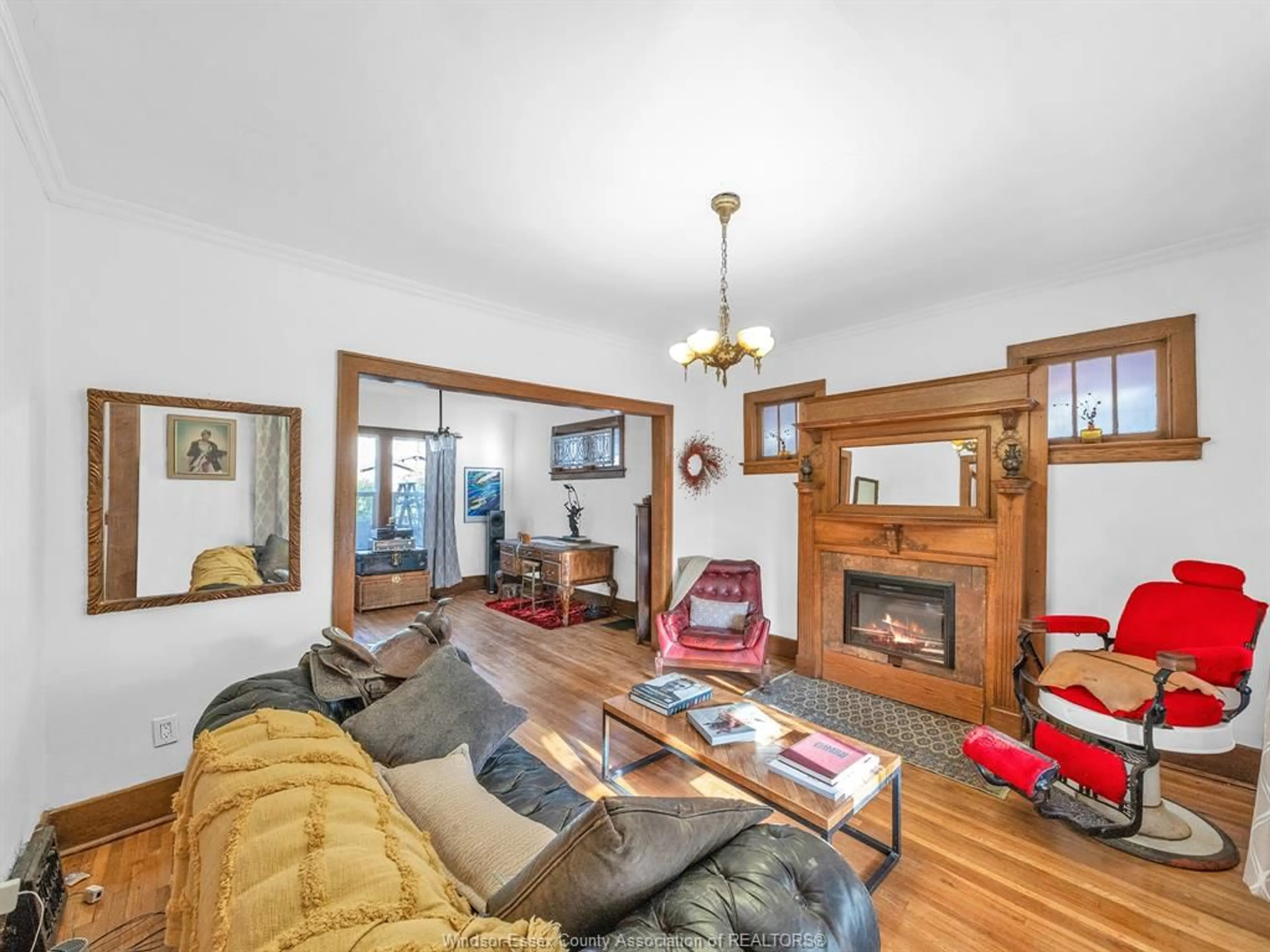 Living room with furniture, wood/laminate floor for 1232 WINDERMERE Rd, Windsor Ontario N8Y 3E8