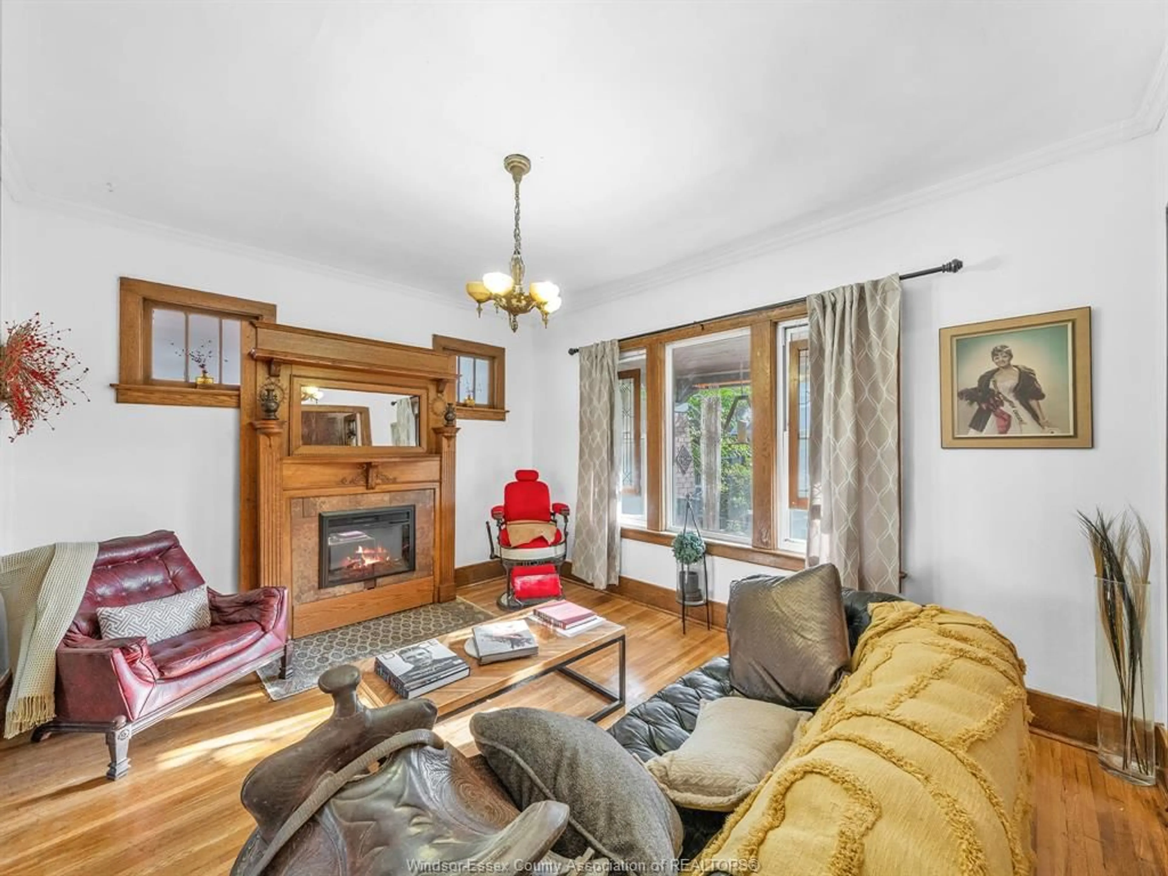 Living room with furniture, wood/laminate floor for 1232 WINDERMERE Rd, Windsor Ontario N8Y 3E8