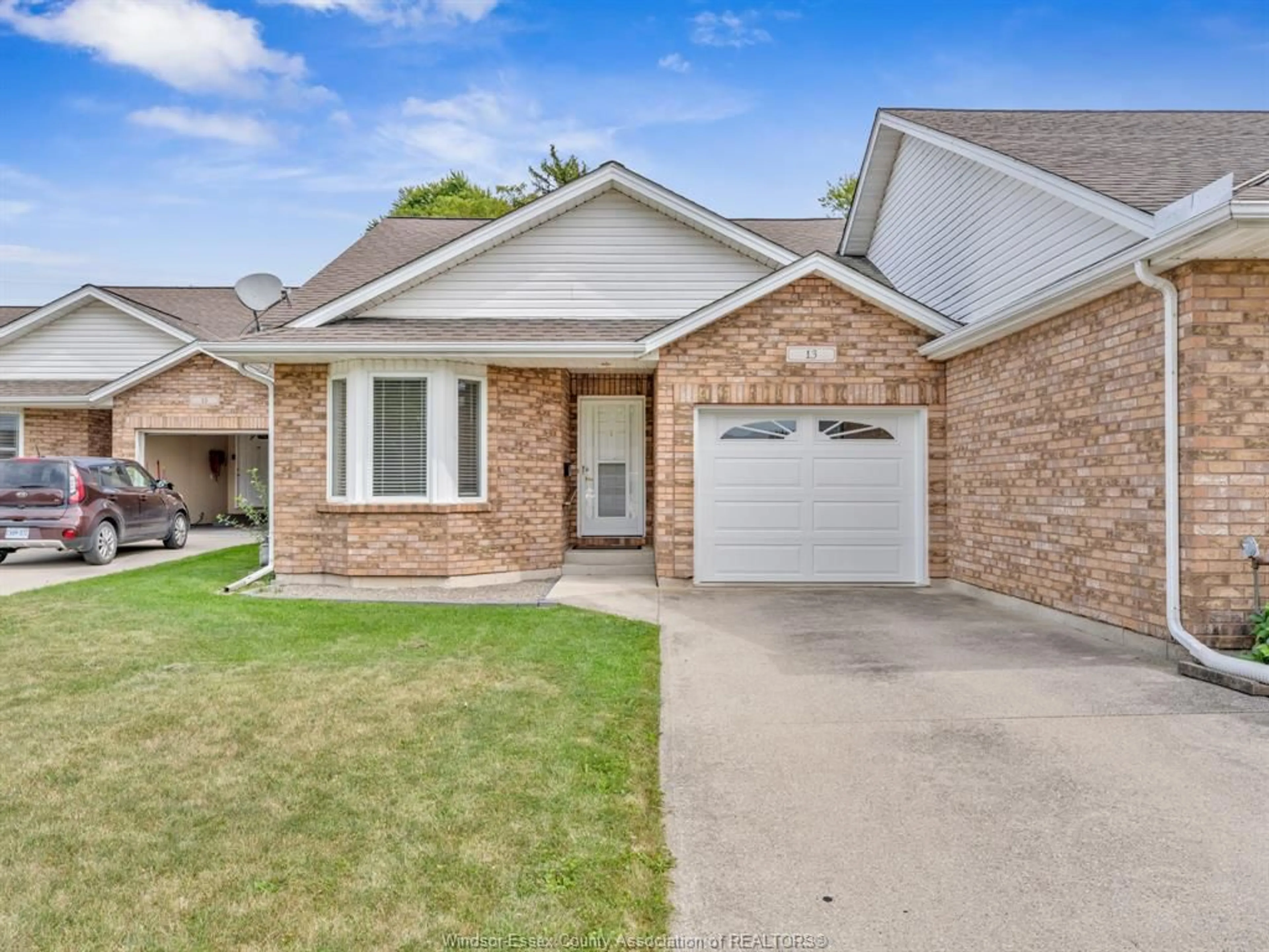 Home with brick exterior material, street for 13 JANS, Kingsville Ontario N9Y 4B6