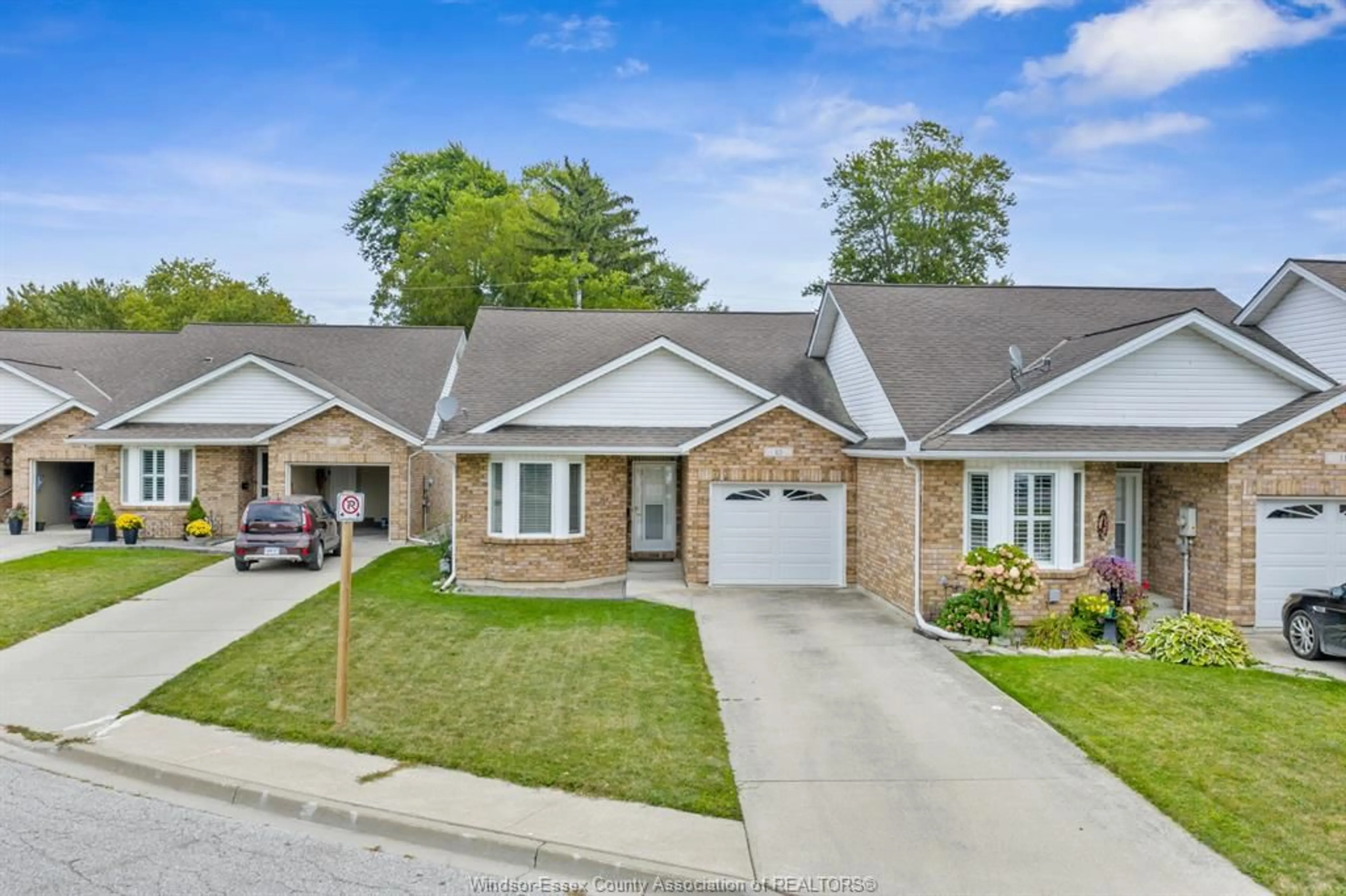 Home with brick exterior material, street for 13 JANS, Kingsville Ontario N9Y 4B6