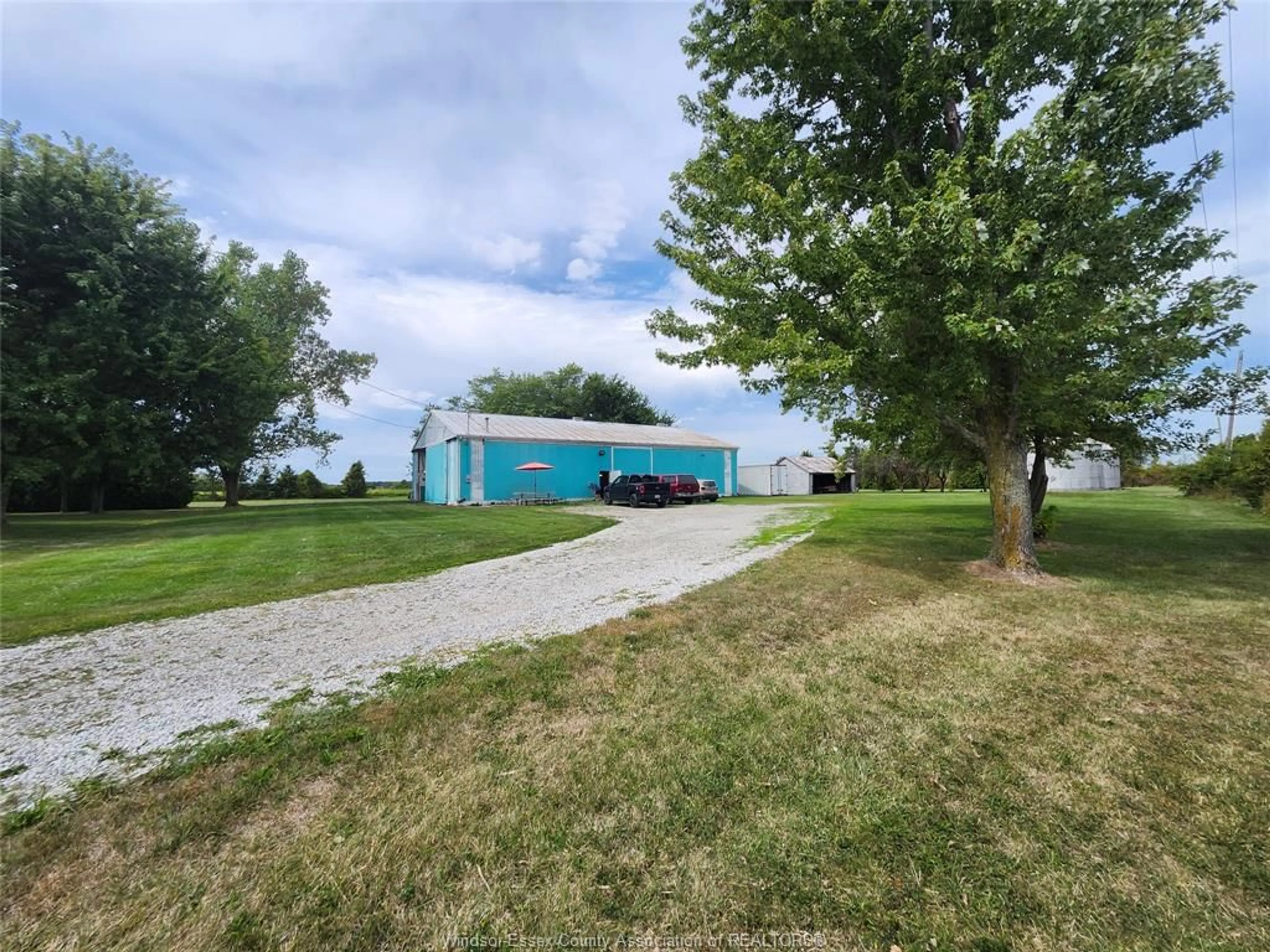 A pic from outside/outdoor area/front of a property/back of a property/a pic from drone, unknown for 1219 LAKESHORE ROAD 105, Maidstone Ontario N0R 1K0