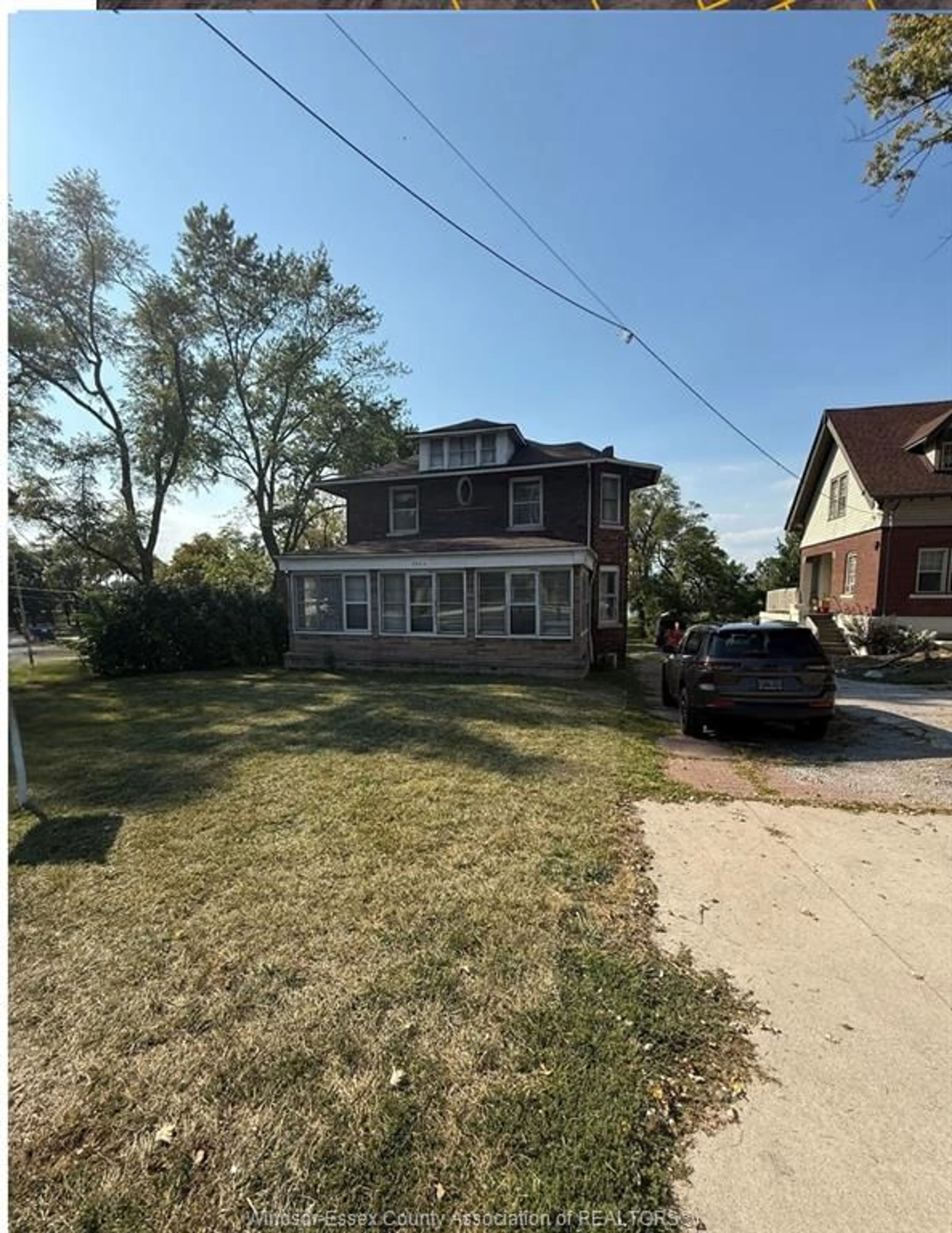 A pic from outside/outdoor area/front of a property/back of a property/a pic from drone, street for 3026 SANDWICH St, Windsor Ontario N9C 1A3