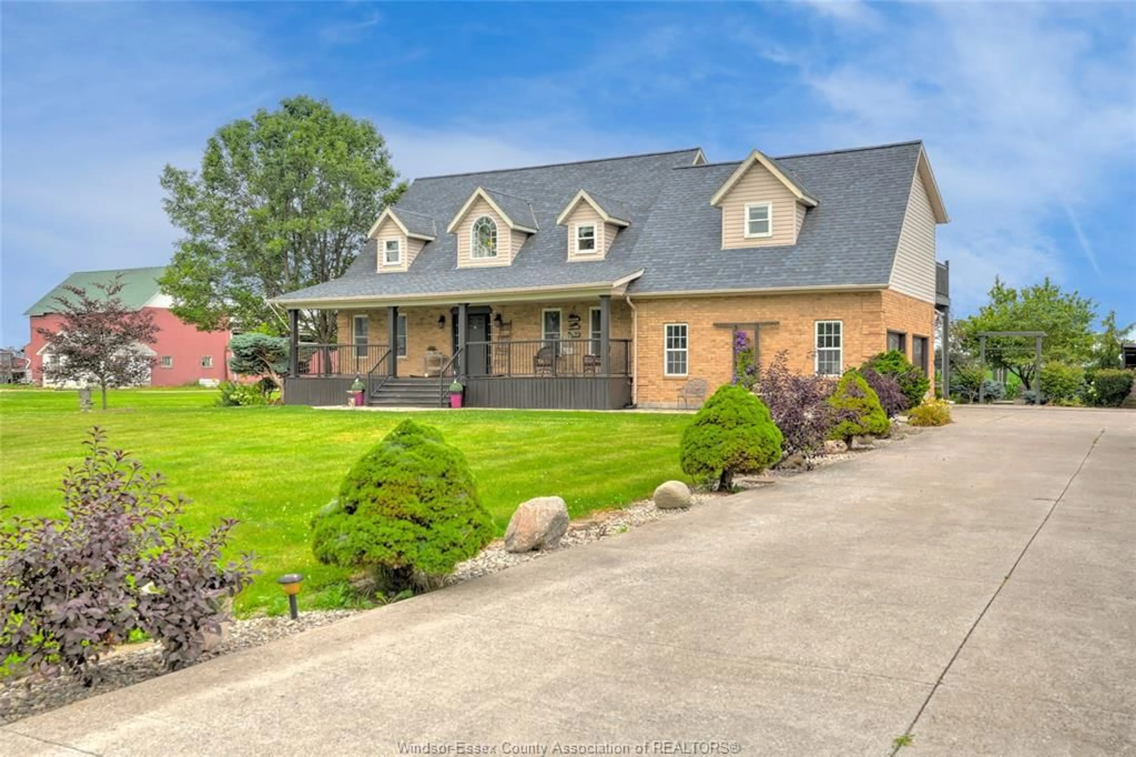 Home with brick exterior material, street for 323 COUNTY RD 27, Kingsville Ontario N0R 1V0