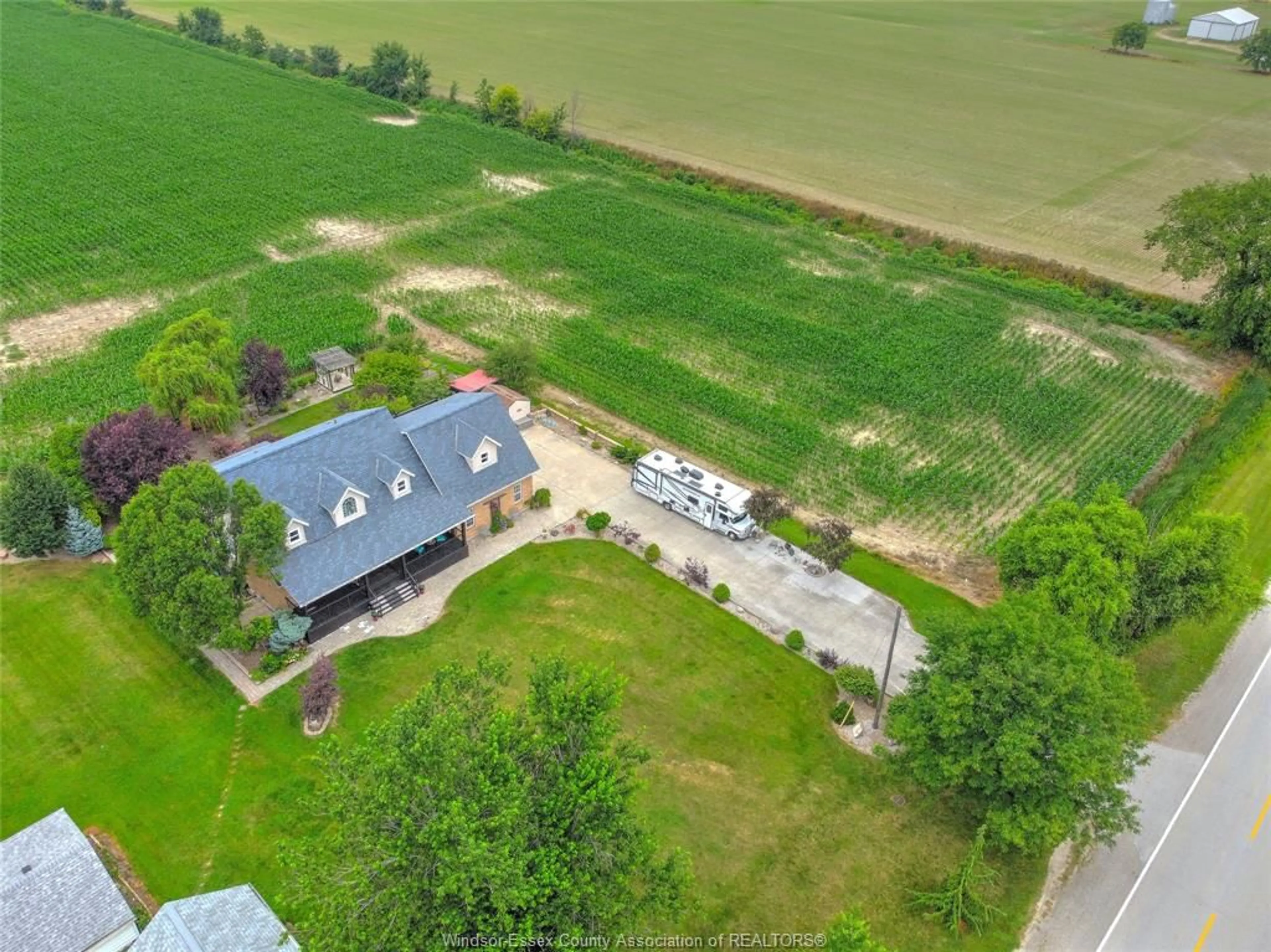 A pic from outside/outdoor area/front of a property/back of a property/a pic from drone, unknown for 323 COUNTY RD 27, Kingsville Ontario N0R 1V0