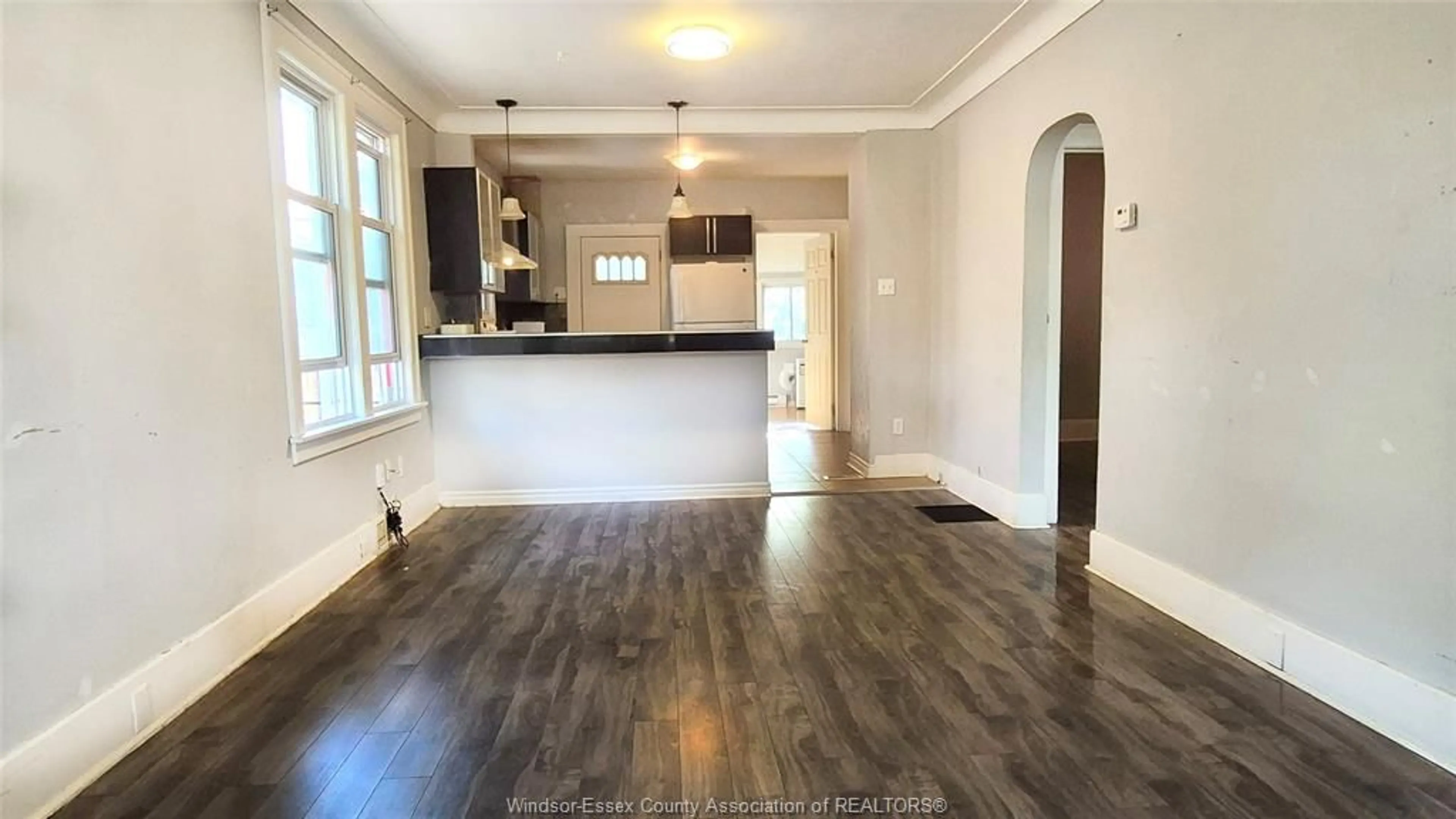 Open concept kitchen, wood/laminate floor for 785 PARTINGTON Ave, Windsor Ontario N9B 2N6