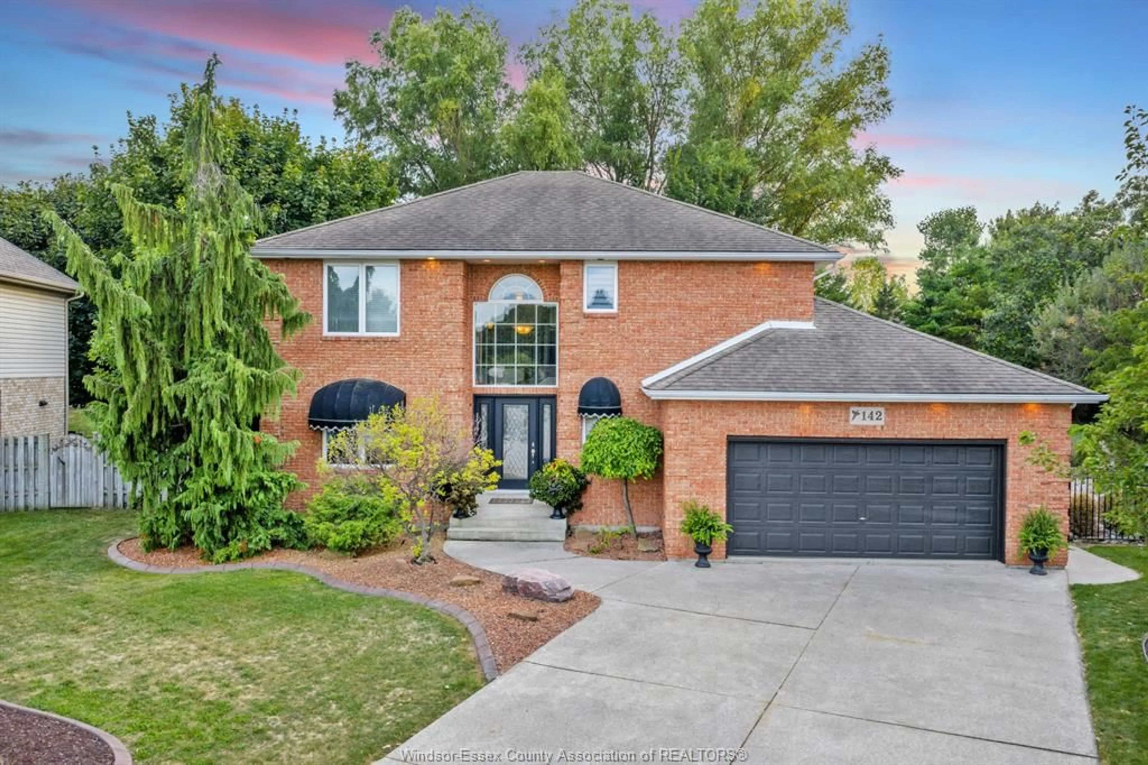 Home with brick exterior material, street for 142 PHEASANT RUN Dr, Lakeshore Ontario N0R 1A0