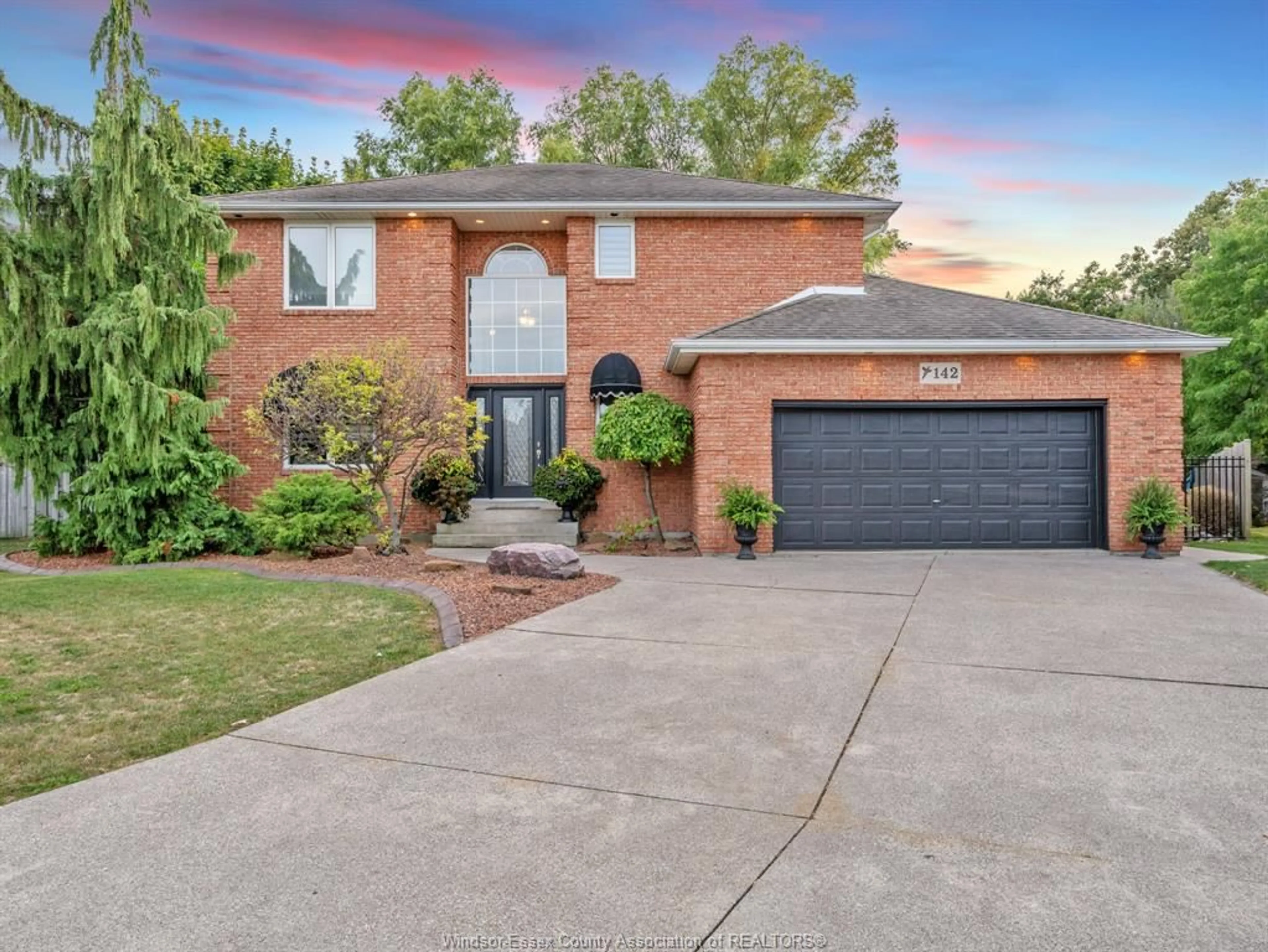 Home with brick exterior material, street for 142 PHEASANT RUN Dr, Lakeshore Ontario N0R 1A0
