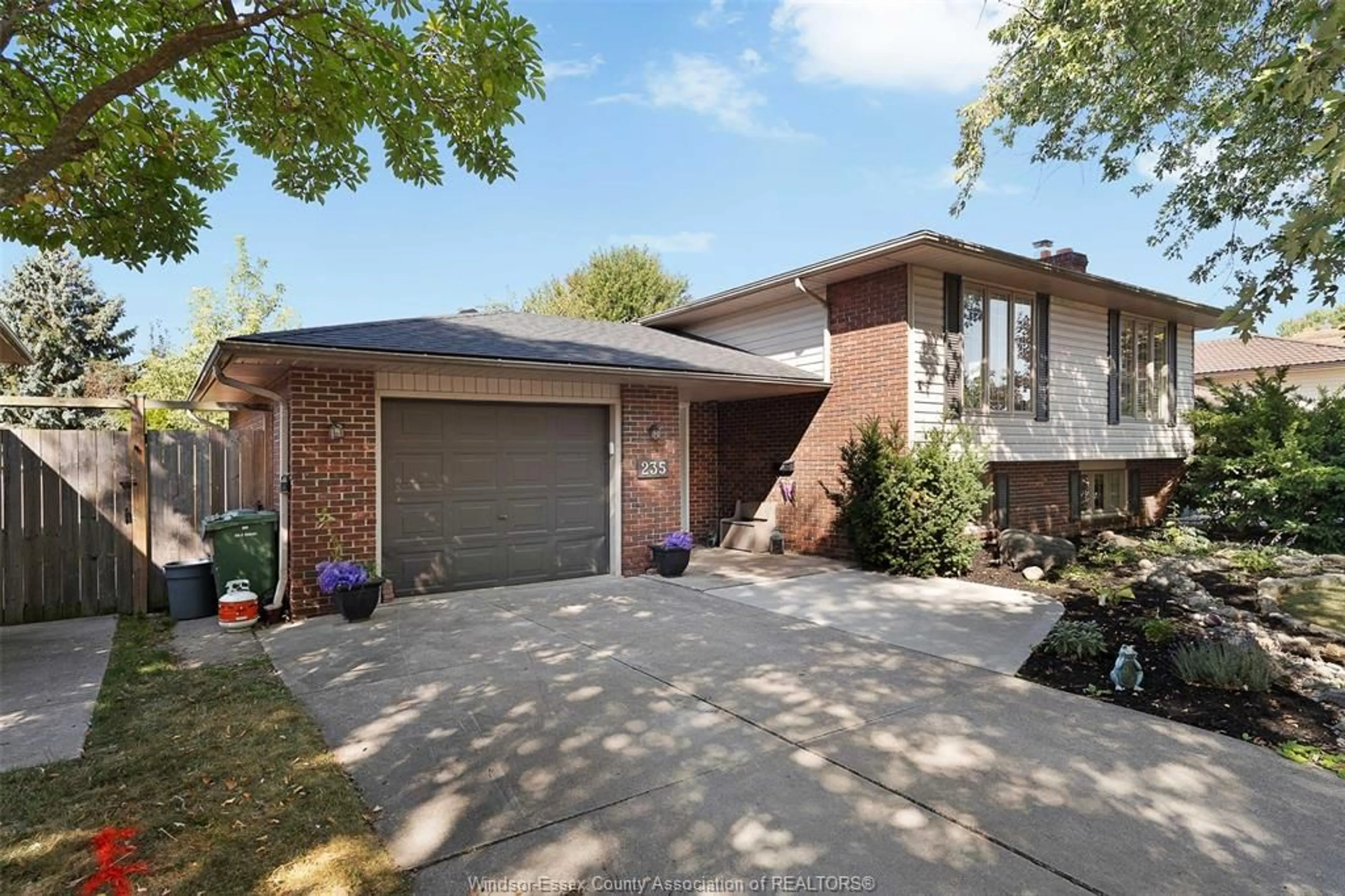 Home with brick exterior material, street for 235 WOODRIDGE, Tecumseh Ontario N8N 3A3