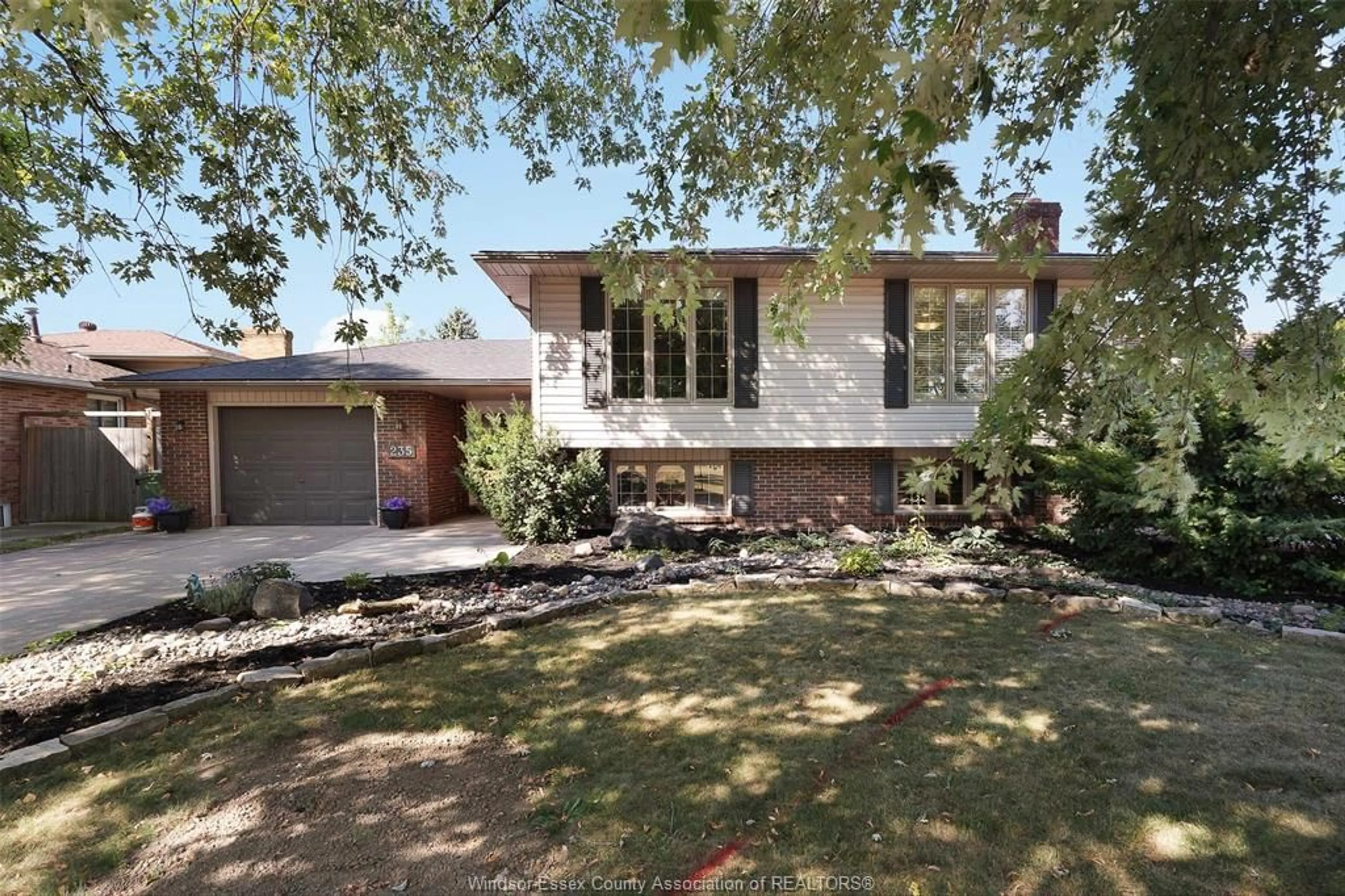 Home with brick exterior material, street for 235 WOODRIDGE, Tecumseh Ontario N8N 3A3