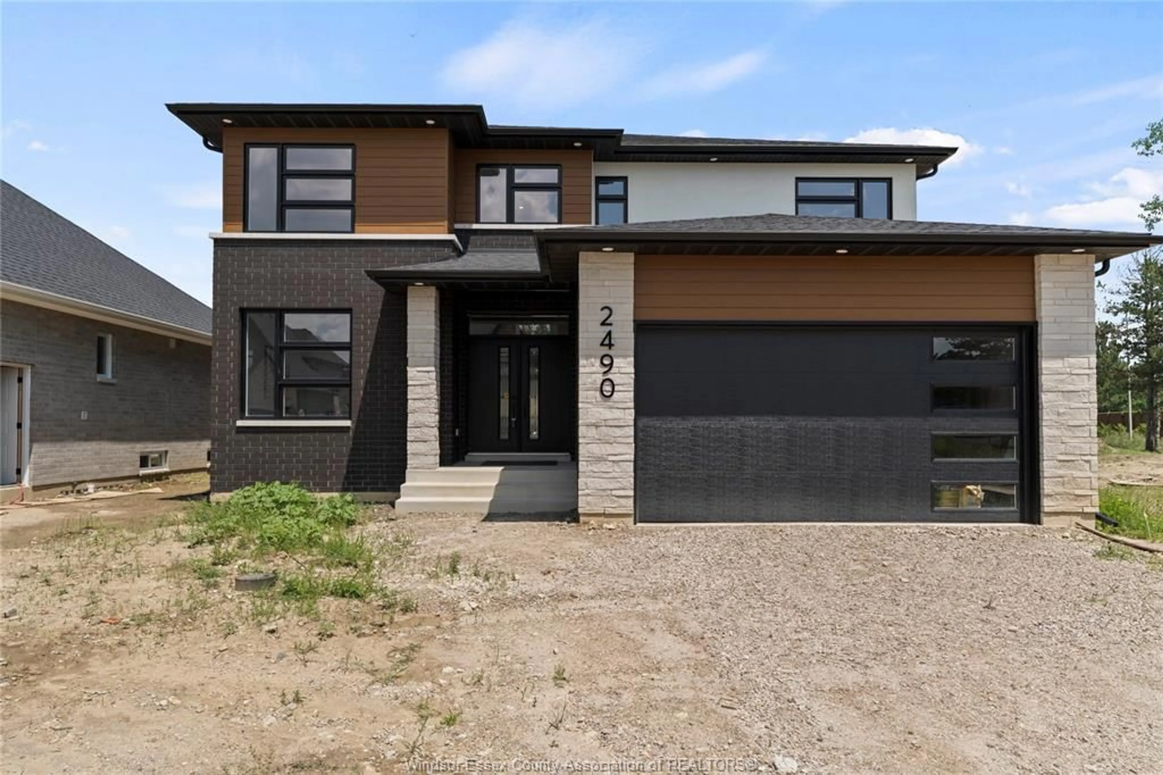 Home with brick exterior material, street for 2490 PARTINGTON, Windsor Ontario N9E 0A9