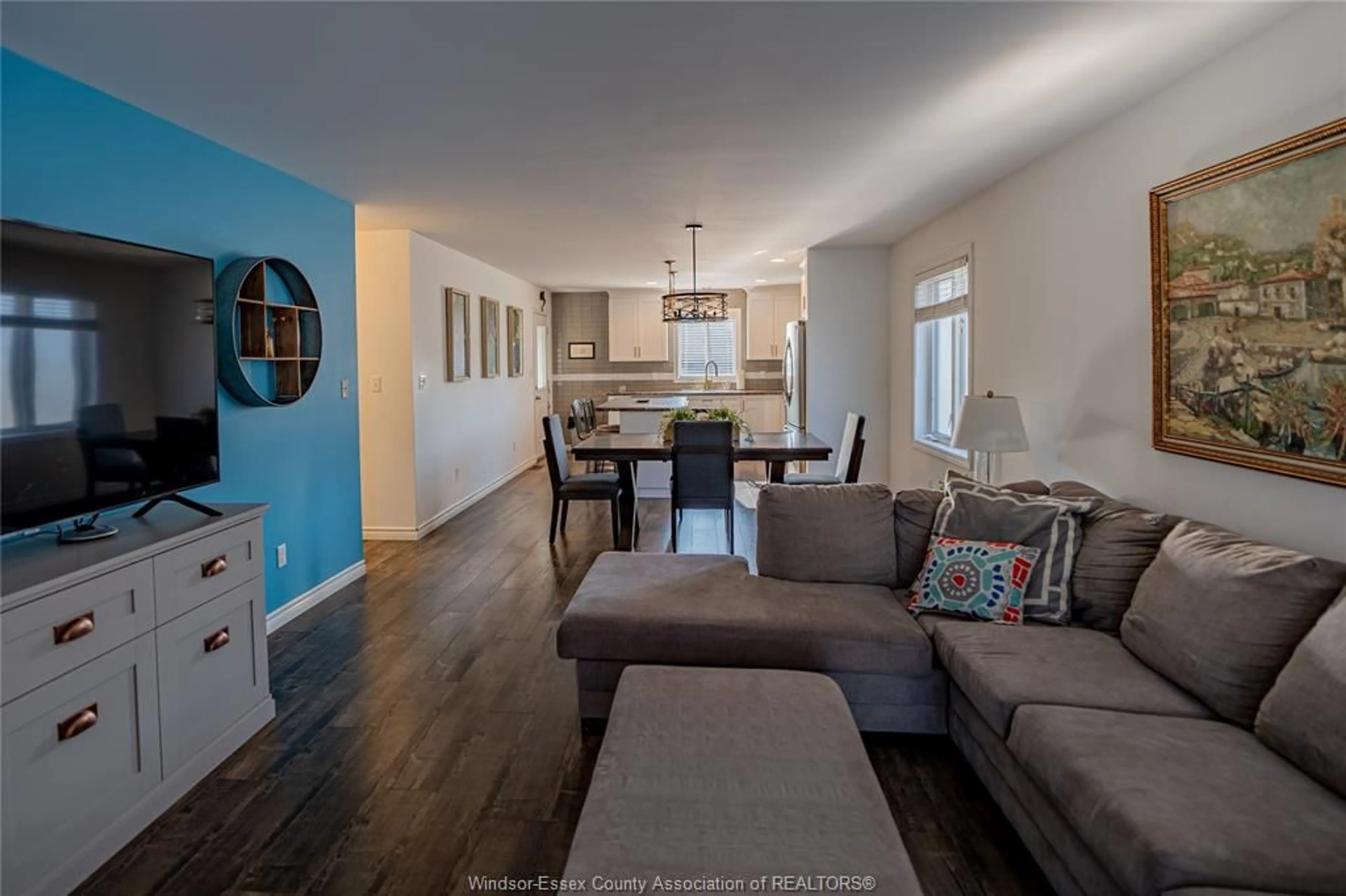 Living room with furniture, wood/laminate floor for 1031 THUNDERBAY Ave, Windsor Ontario N8P 0C1