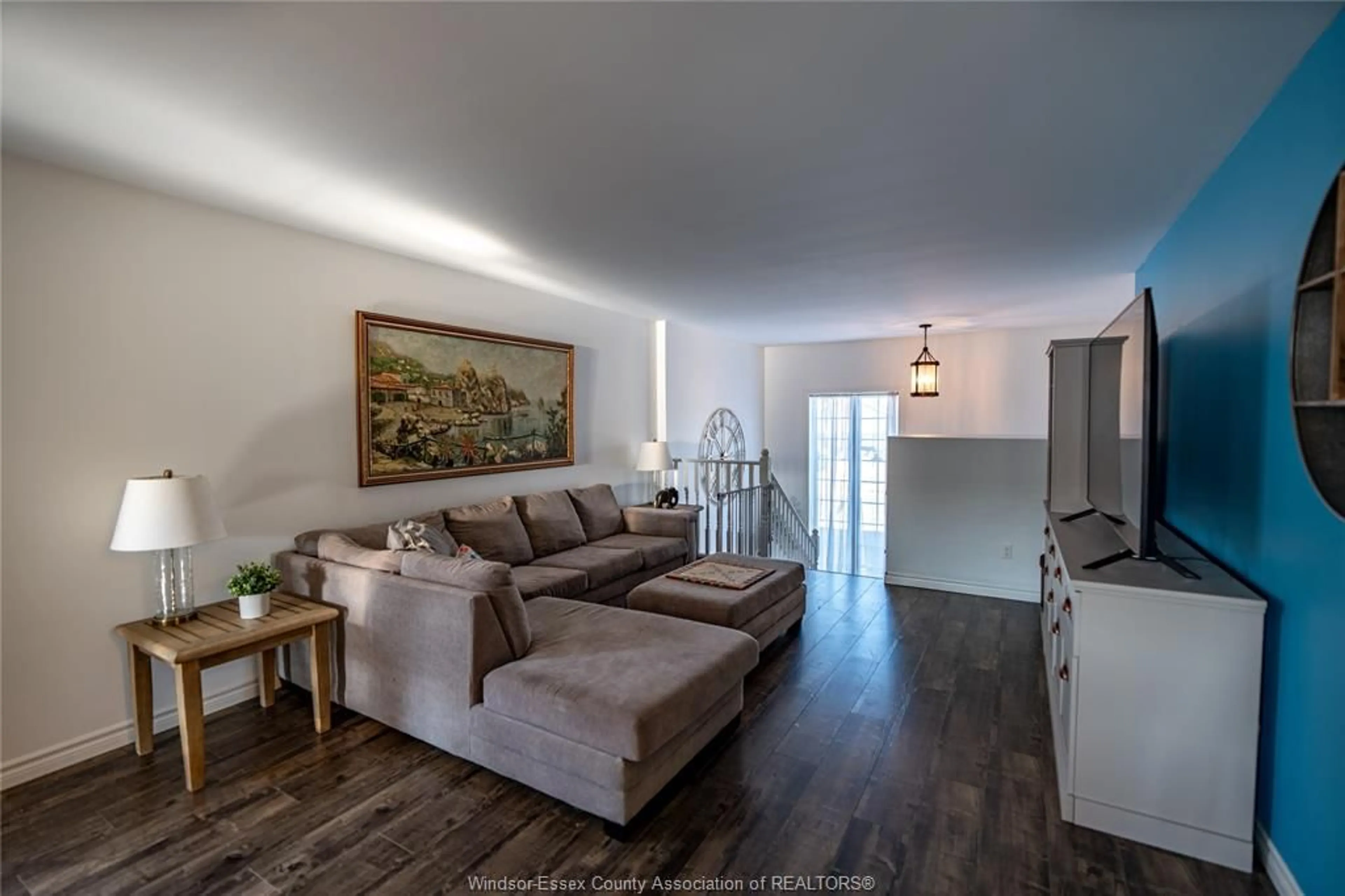 Living room with furniture, wood/laminate floor for 1031 THUNDERBAY Ave, Windsor Ontario N8P 0C1