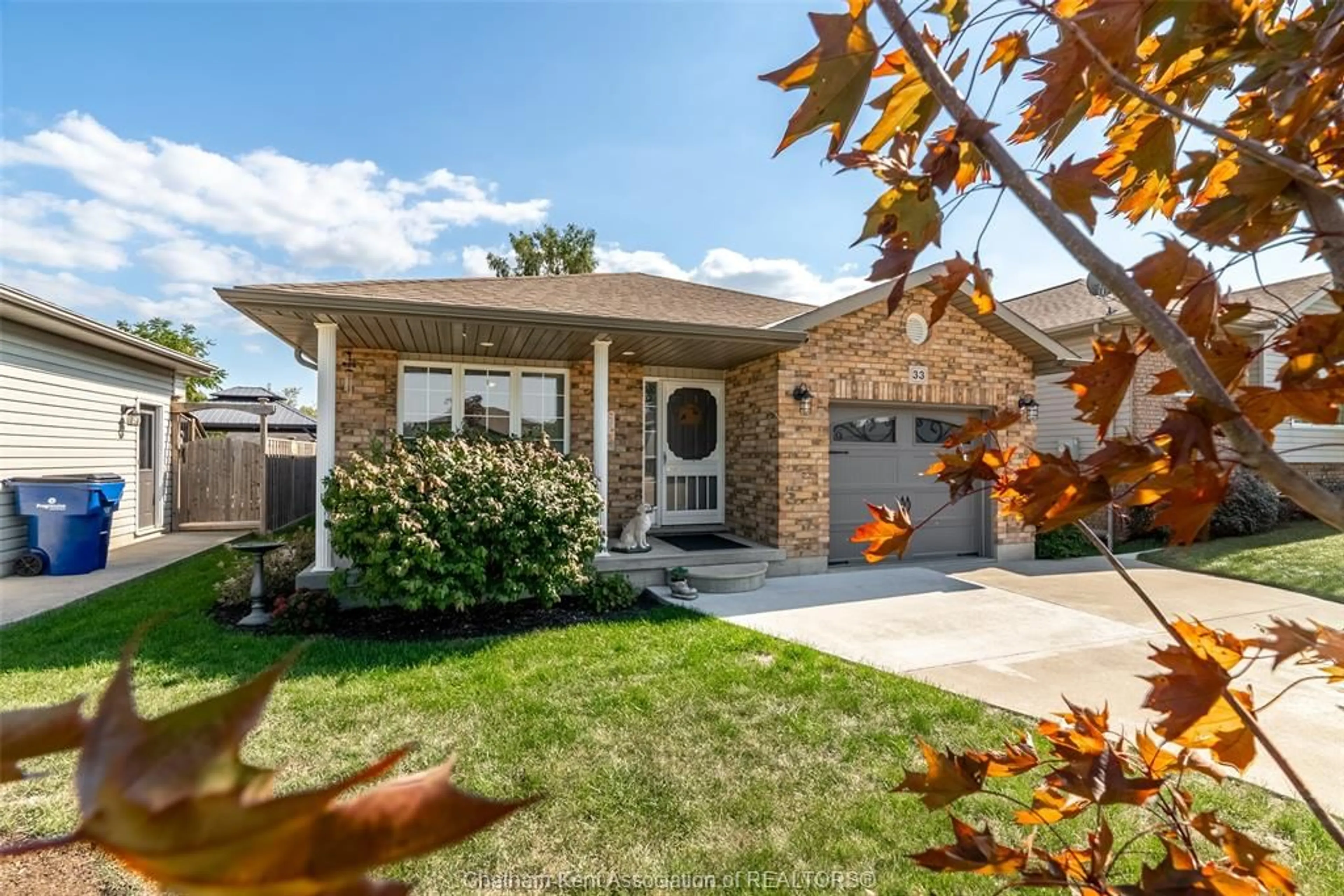 Home with brick exterior material, street for 33 Azar Ave, Tilbury Ontario N0P 2L0