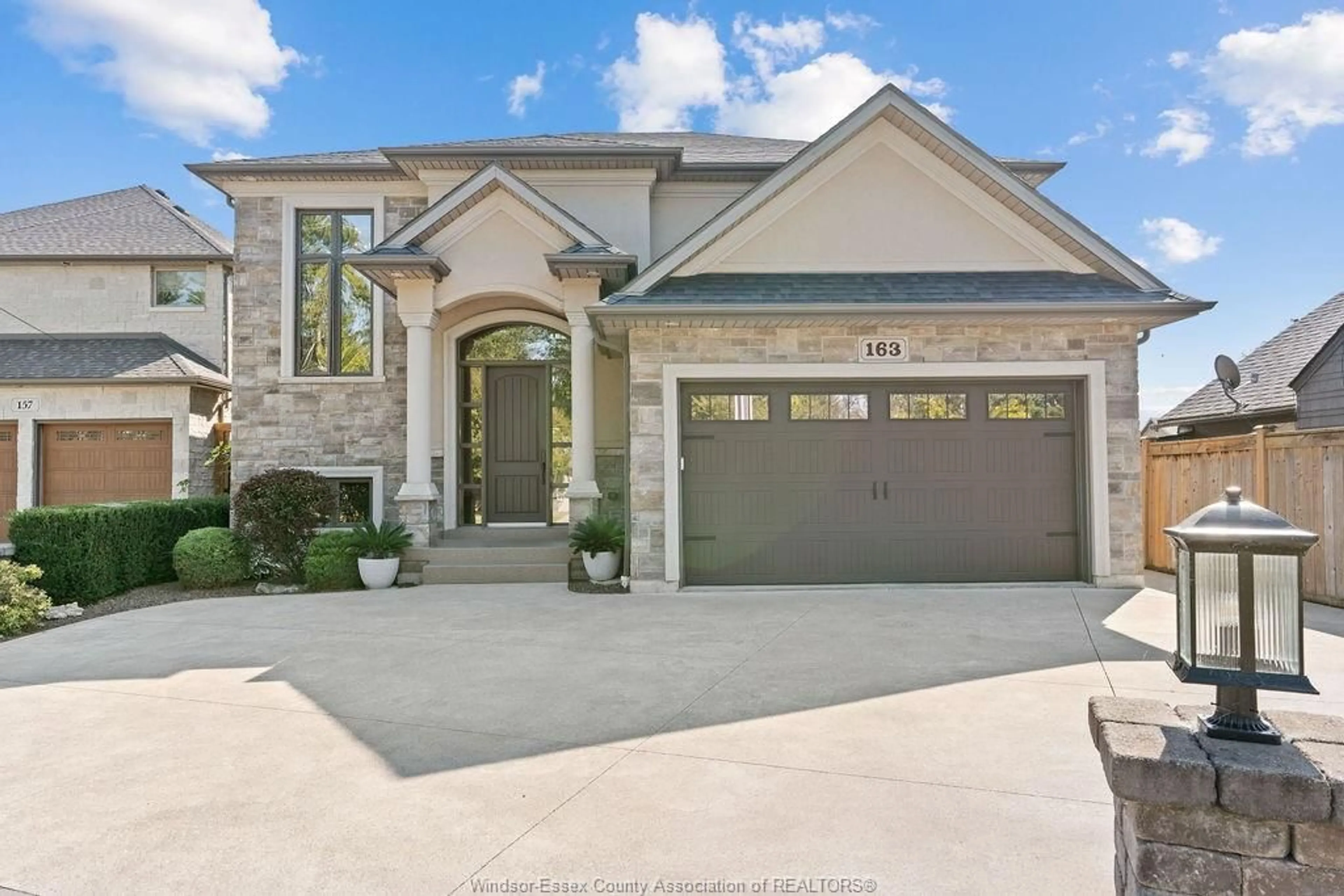 Home with brick exterior material, street for 163 WEST RIVER, Lakeshore Ontario N0R 1A0