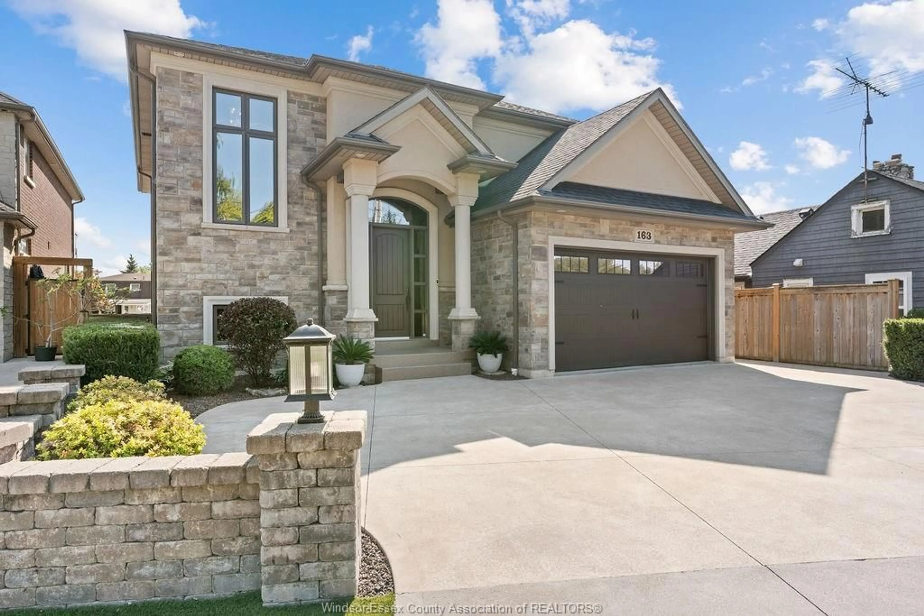 Home with brick exterior material, street for 163 WEST RIVER, Lakeshore Ontario N0R 1A0