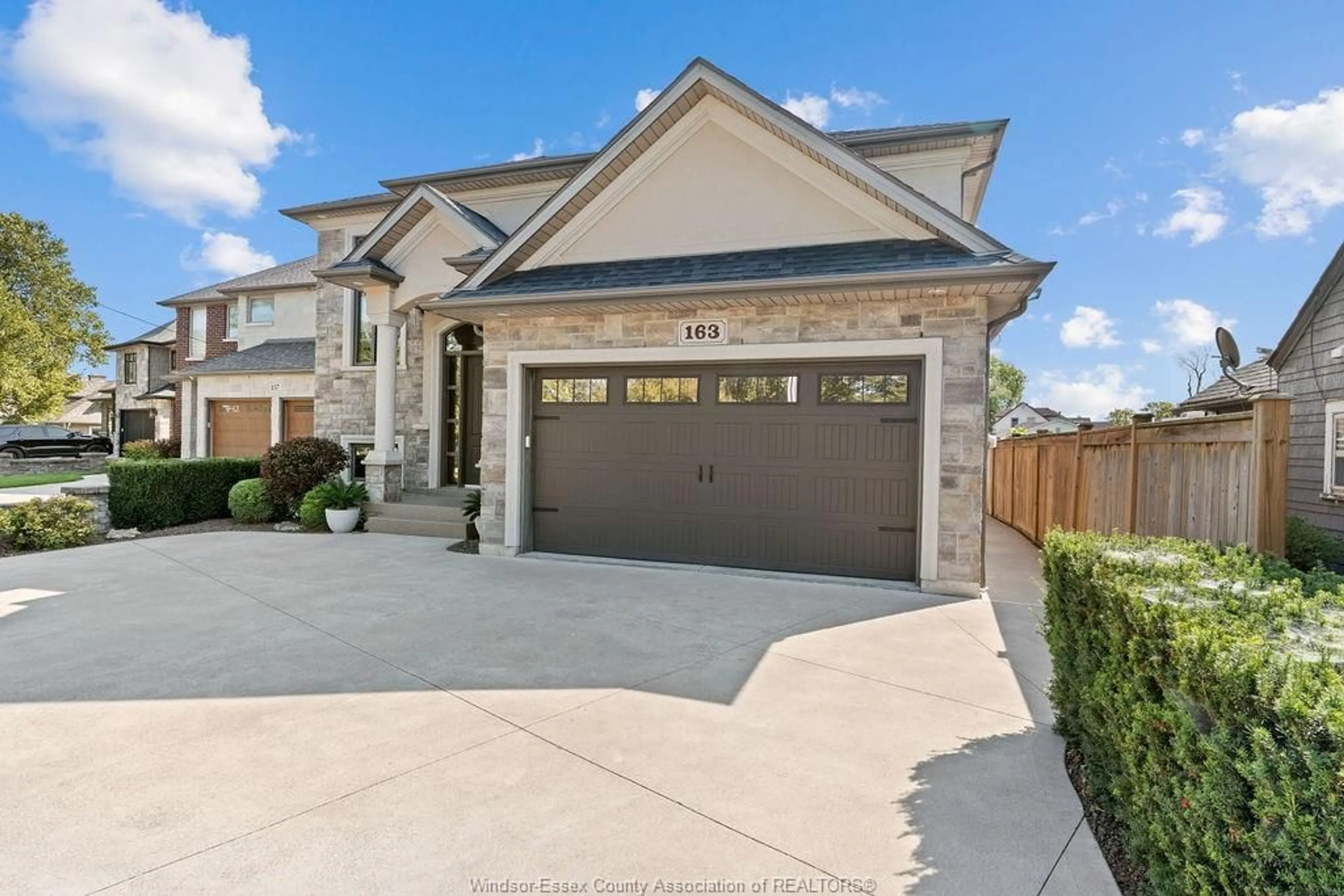 Home with brick exterior material, street for 163 WEST RIVER, Lakeshore Ontario N0R 1A0