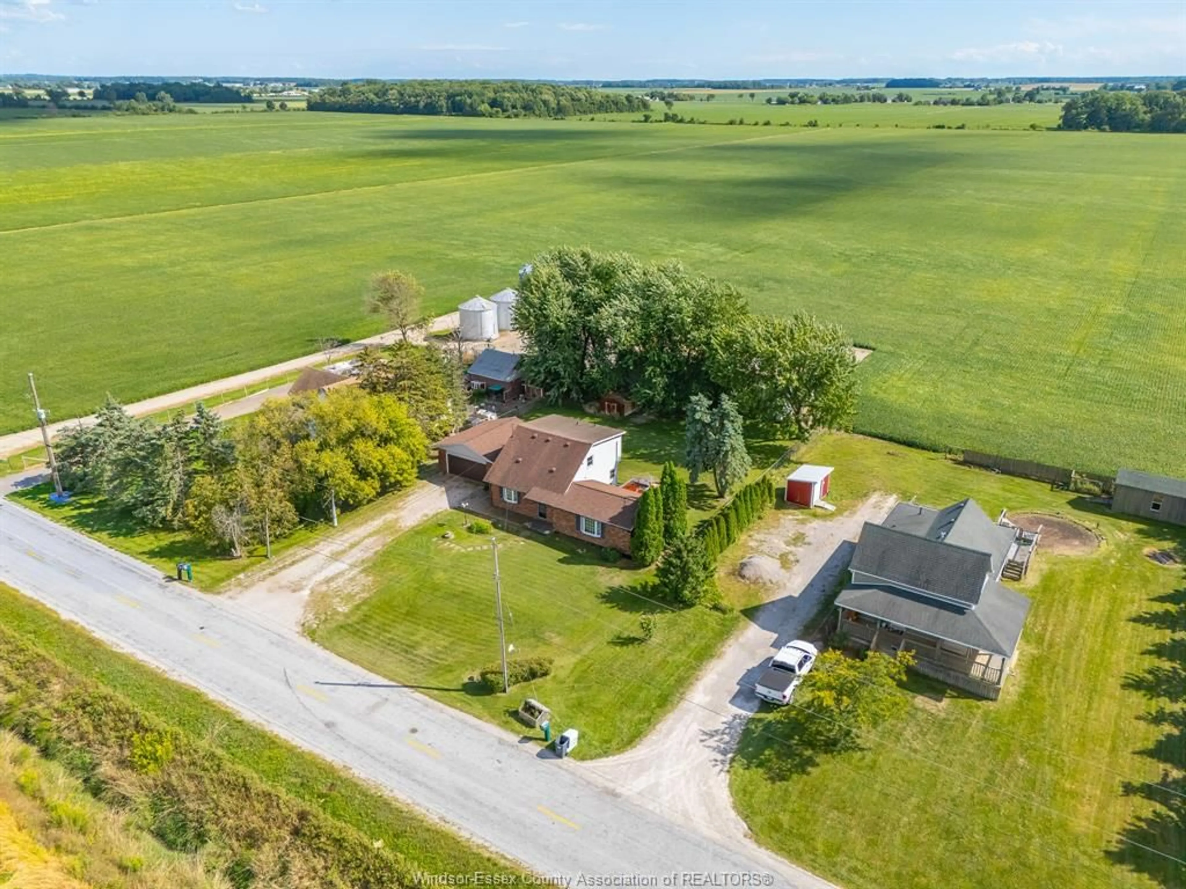A pic from outside/outdoor area/front of a property/back of a property/a pic from drone, unknown for 220 ROAD 8 W, Kingsville Ontario N8M 2X5