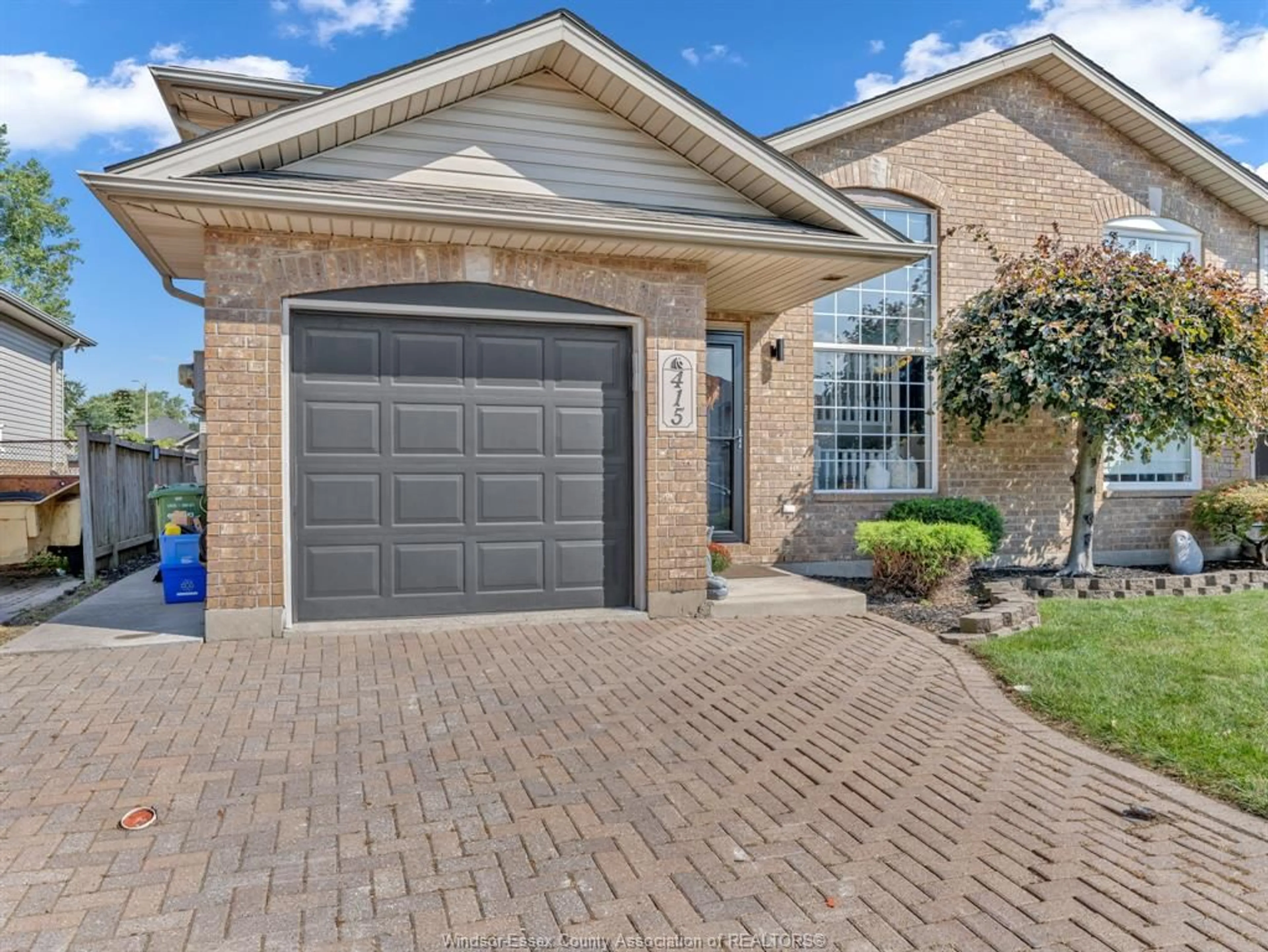 Home with brick exterior material, street for 415 MERRILL Ave, LaSalle Ontario N9J 3R2