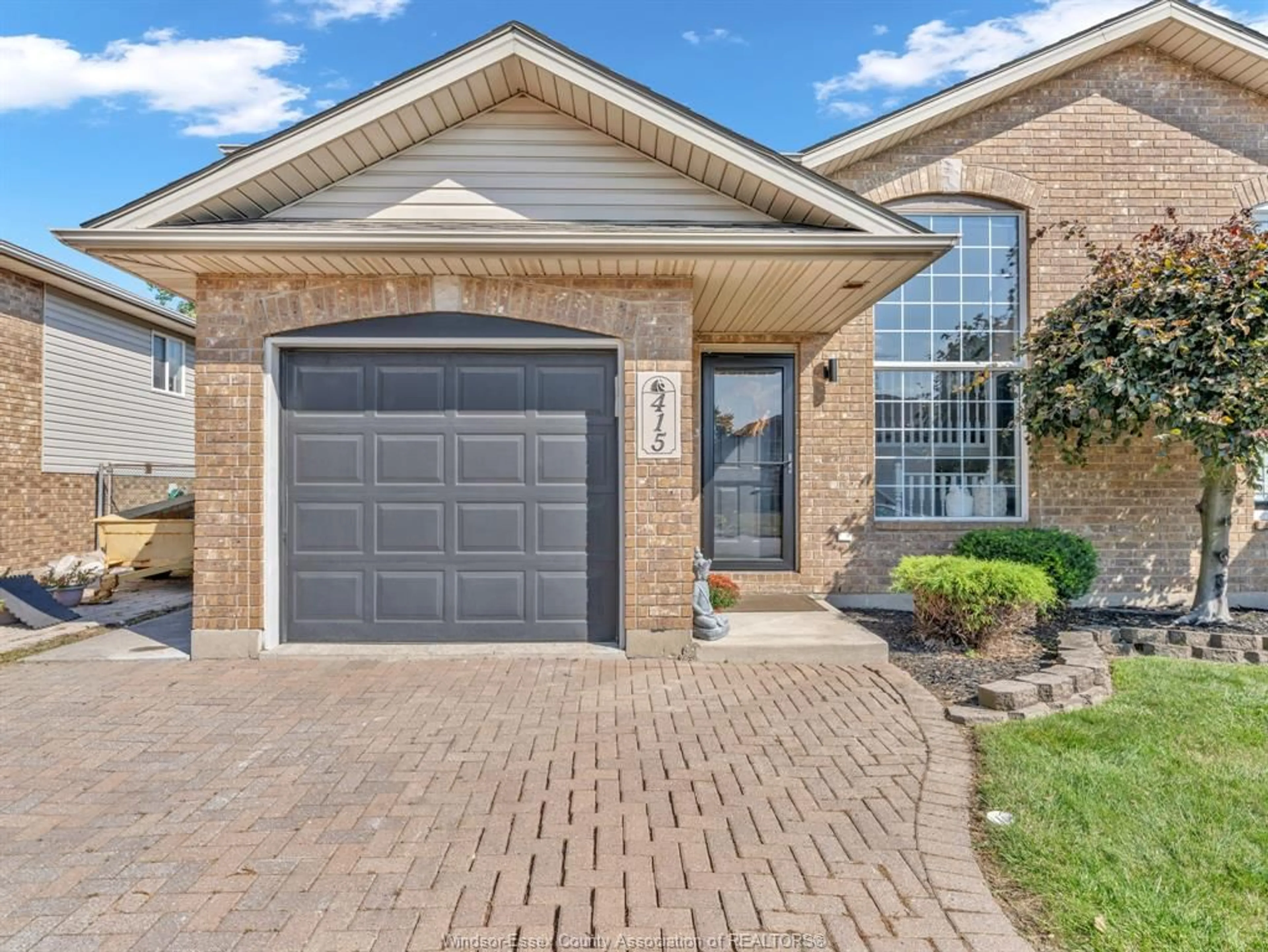 Home with brick exterior material, street for 415 MERRILL Ave, LaSalle Ontario N9J 3R2