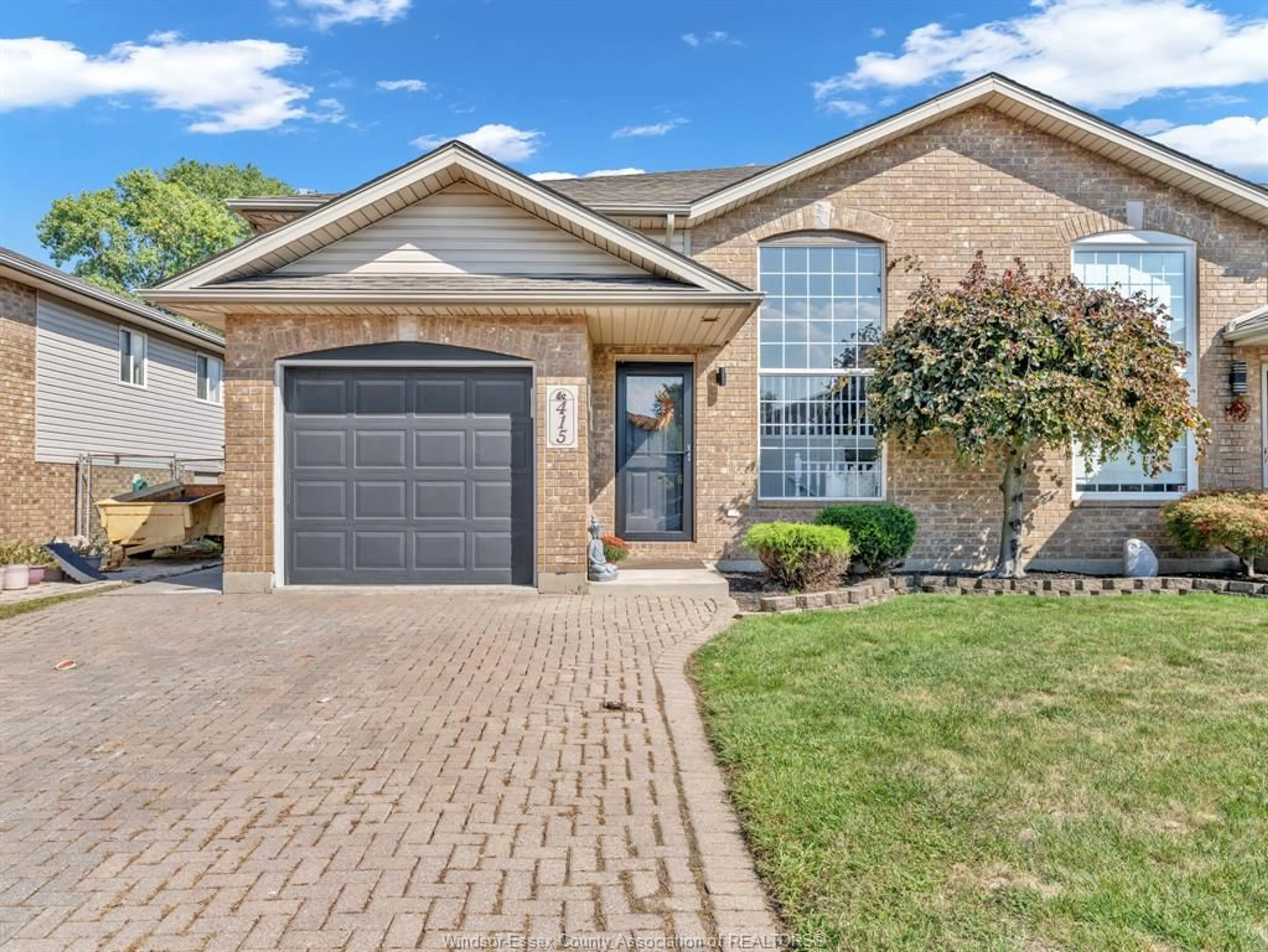 Home with brick exterior material, street for 415 MERRILL Ave, LaSalle Ontario N9J 3R2