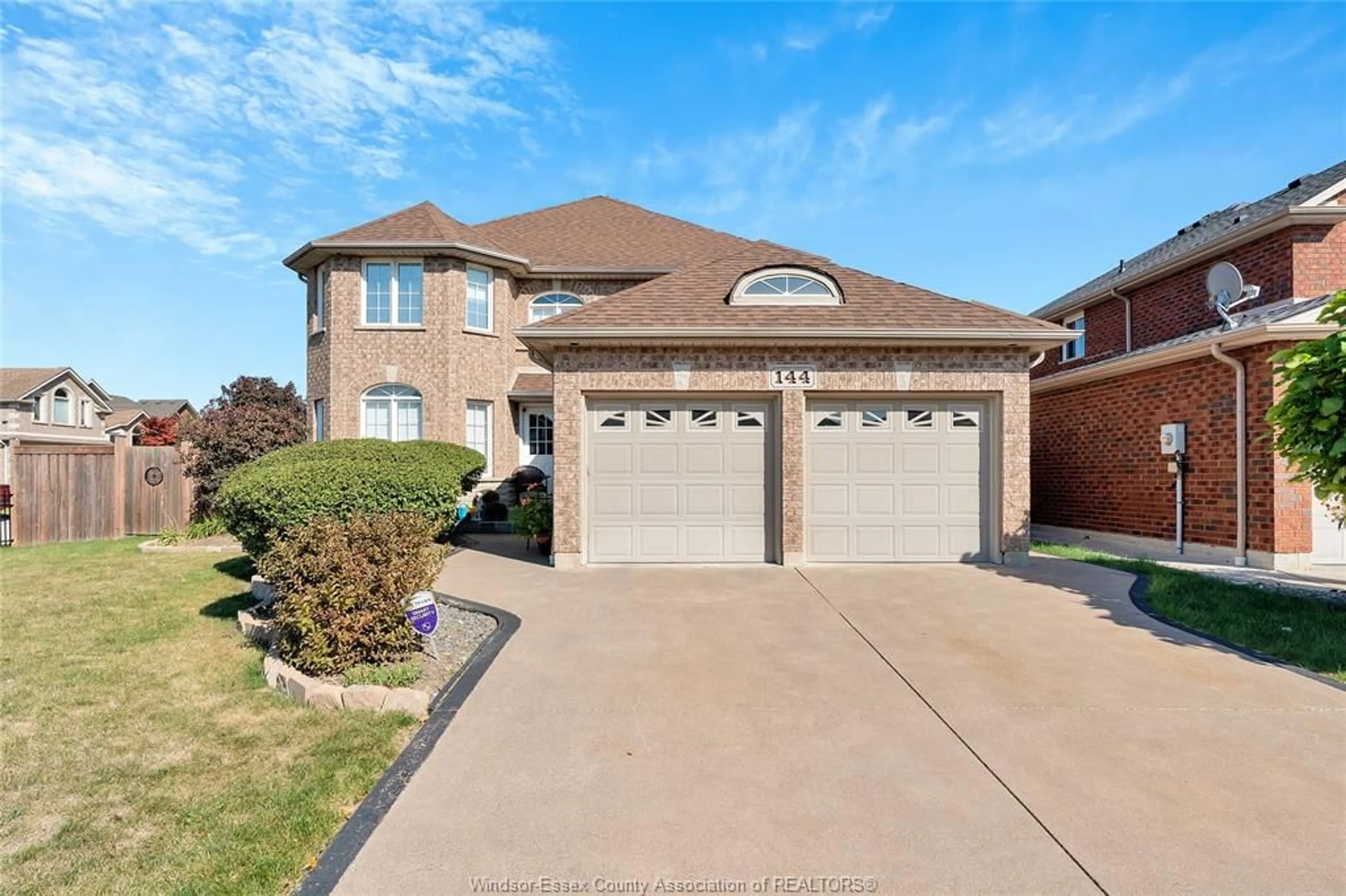Home with brick exterior material, street for 144 SHADY SPRING Cres, Lakeshore Ontario N9K 1E7