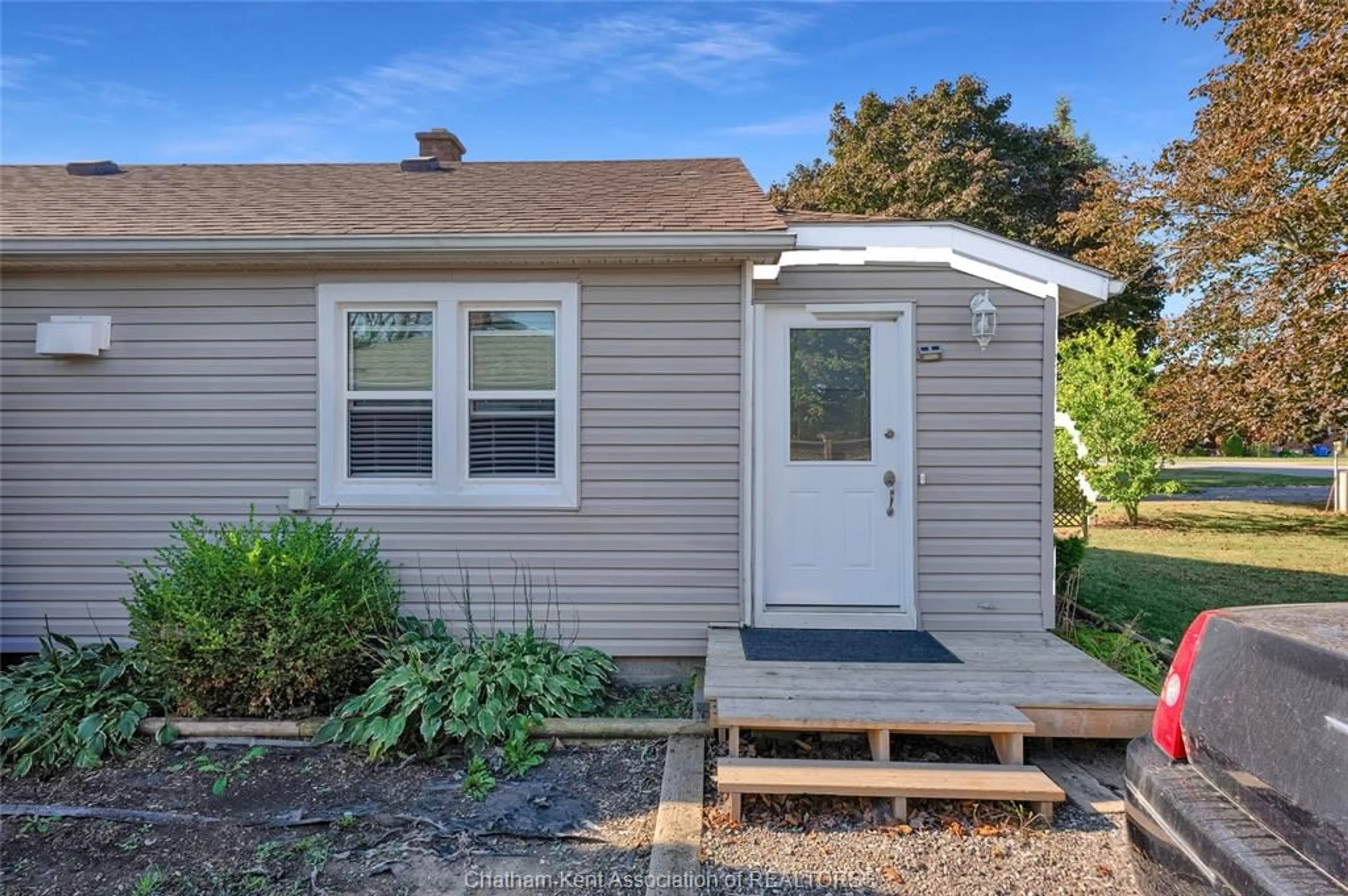 Home with vinyl exterior material, street for 9186 Talbot Trail, Blenheim Ontario N0P 1A0