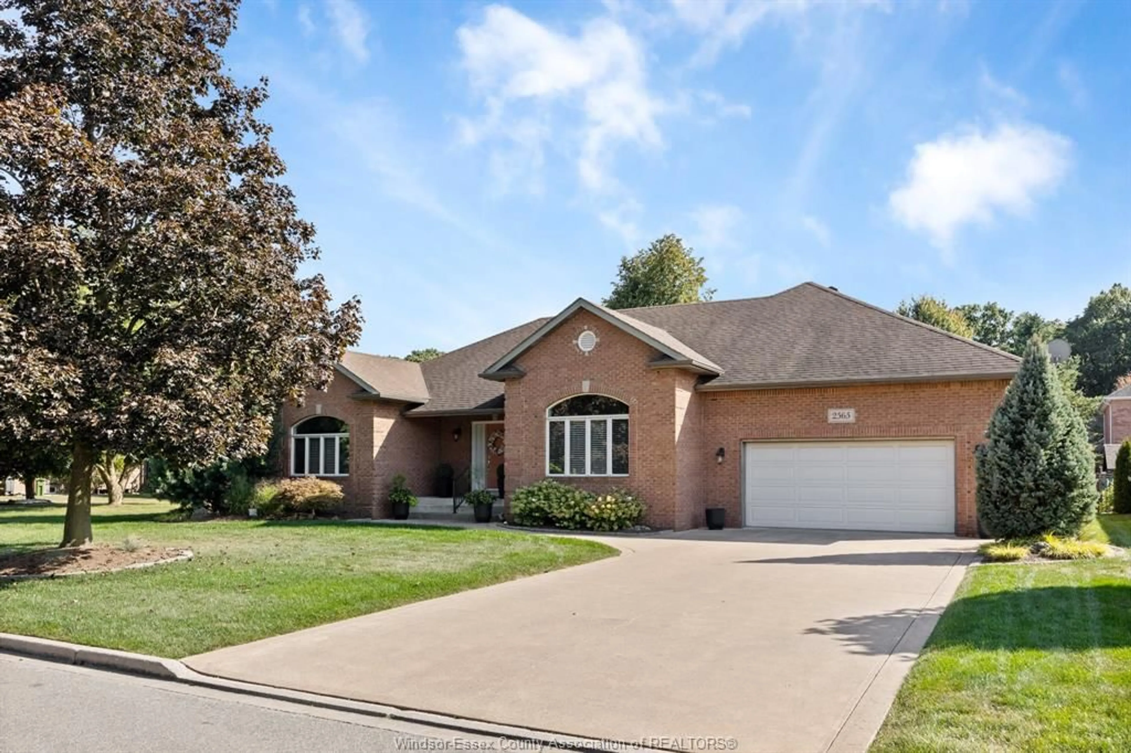 Home with brick exterior material, street for 2565 BRIDGEWAY Blvd, LaSalle Ontario N9H 2K6