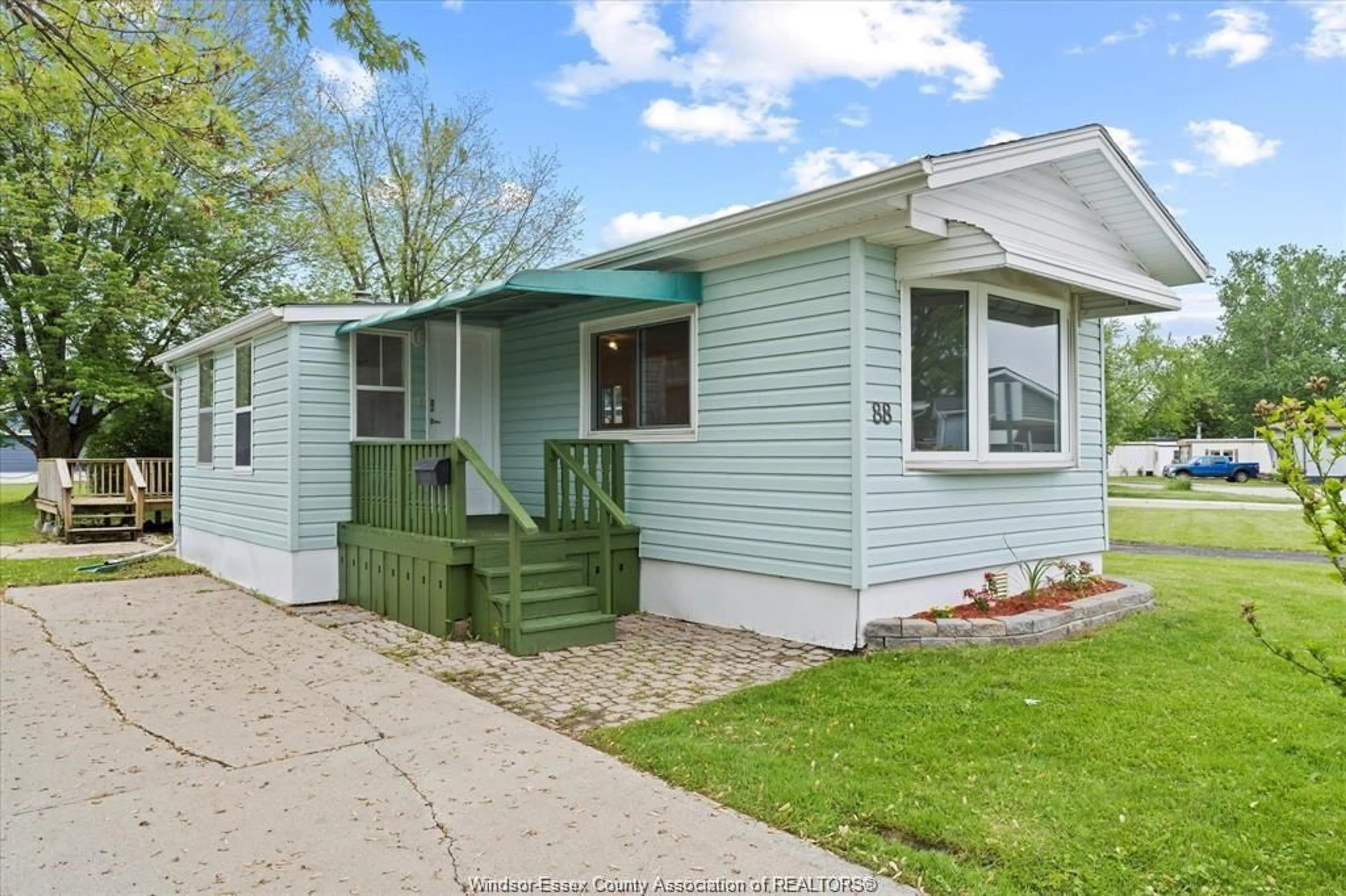 Home with vinyl exterior material, street for 88 DANA, Essex Ontario N8M 1Z8