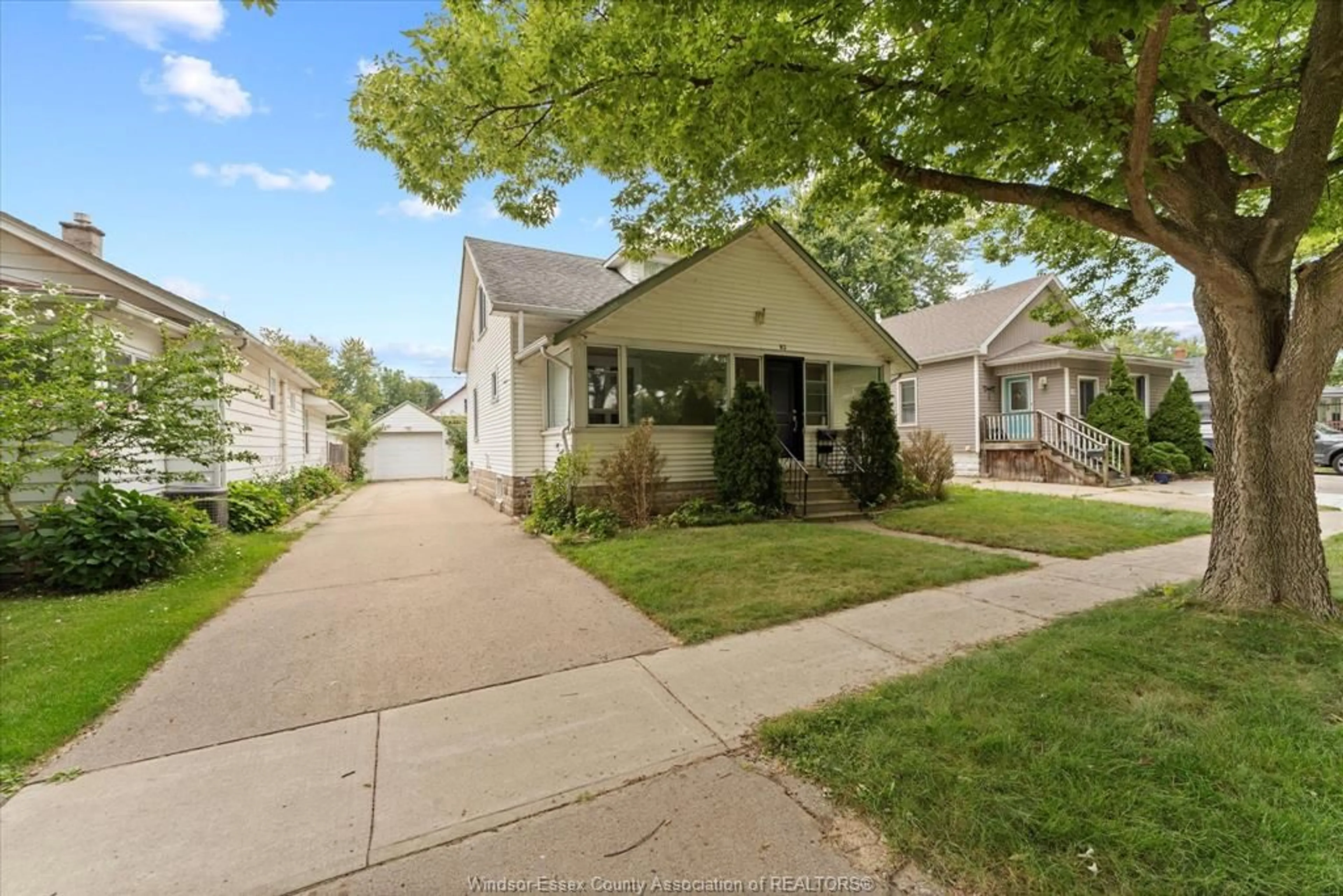 Home with vinyl exterior material, street for 83 WIGLE St, Leamington Ontario N8H 2T3