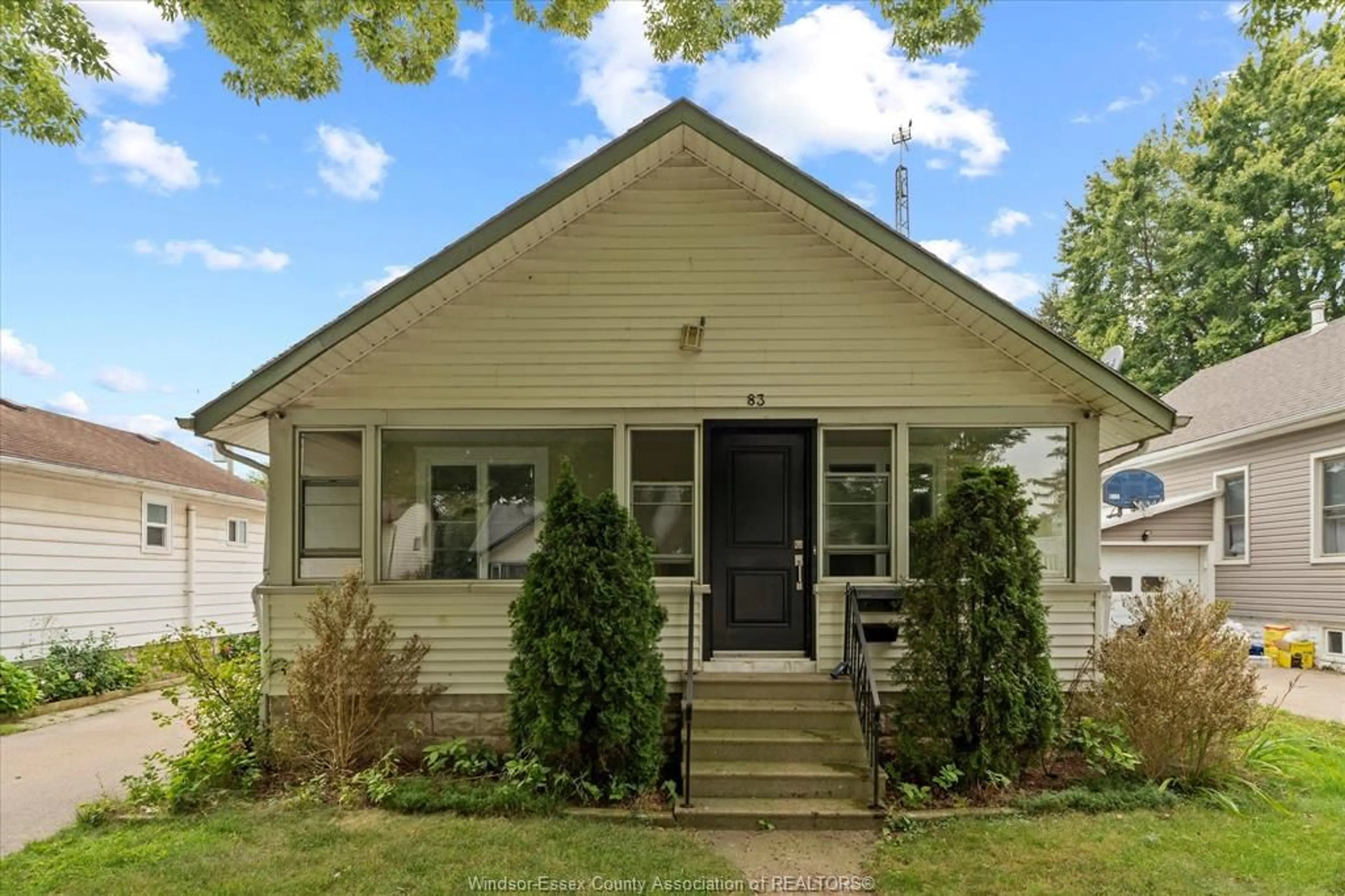 Home with vinyl exterior material, street for 83 WIGLE St, Leamington Ontario N8H 2T3