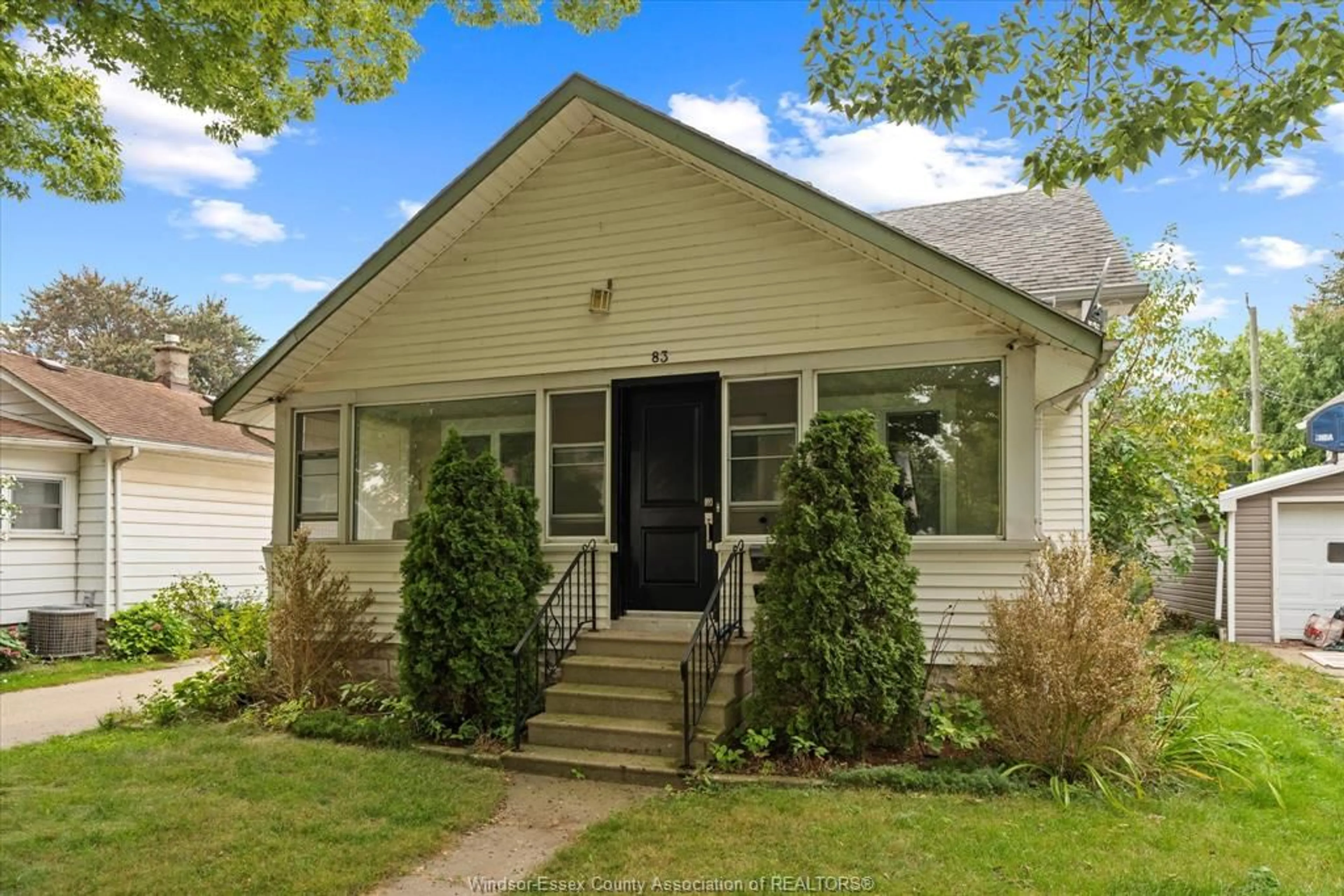 Home with vinyl exterior material, street for 83 WIGLE St, Leamington Ontario N8H 2T3