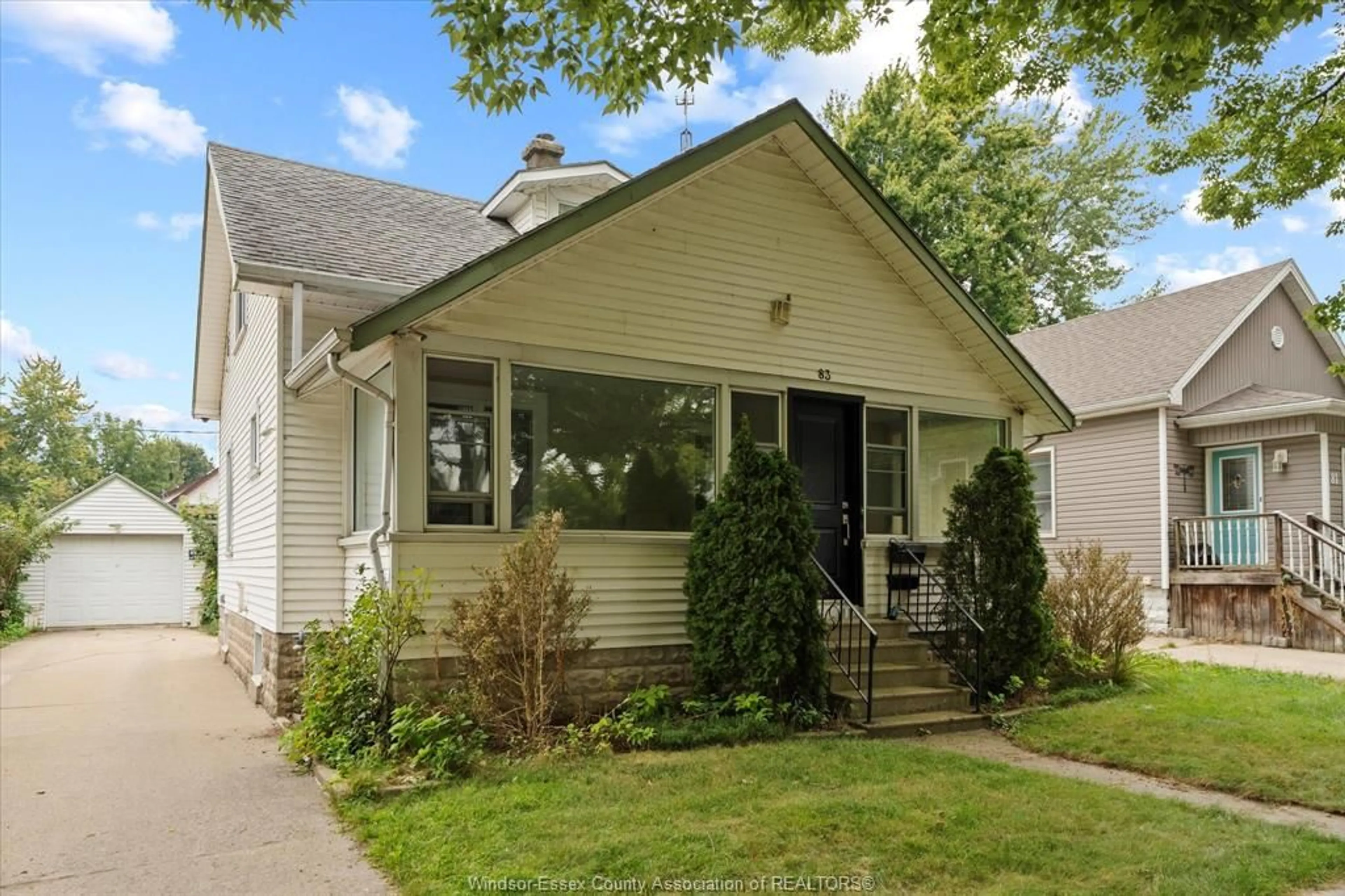 Home with vinyl exterior material, street for 83 WIGLE St, Leamington Ontario N8H 2T3