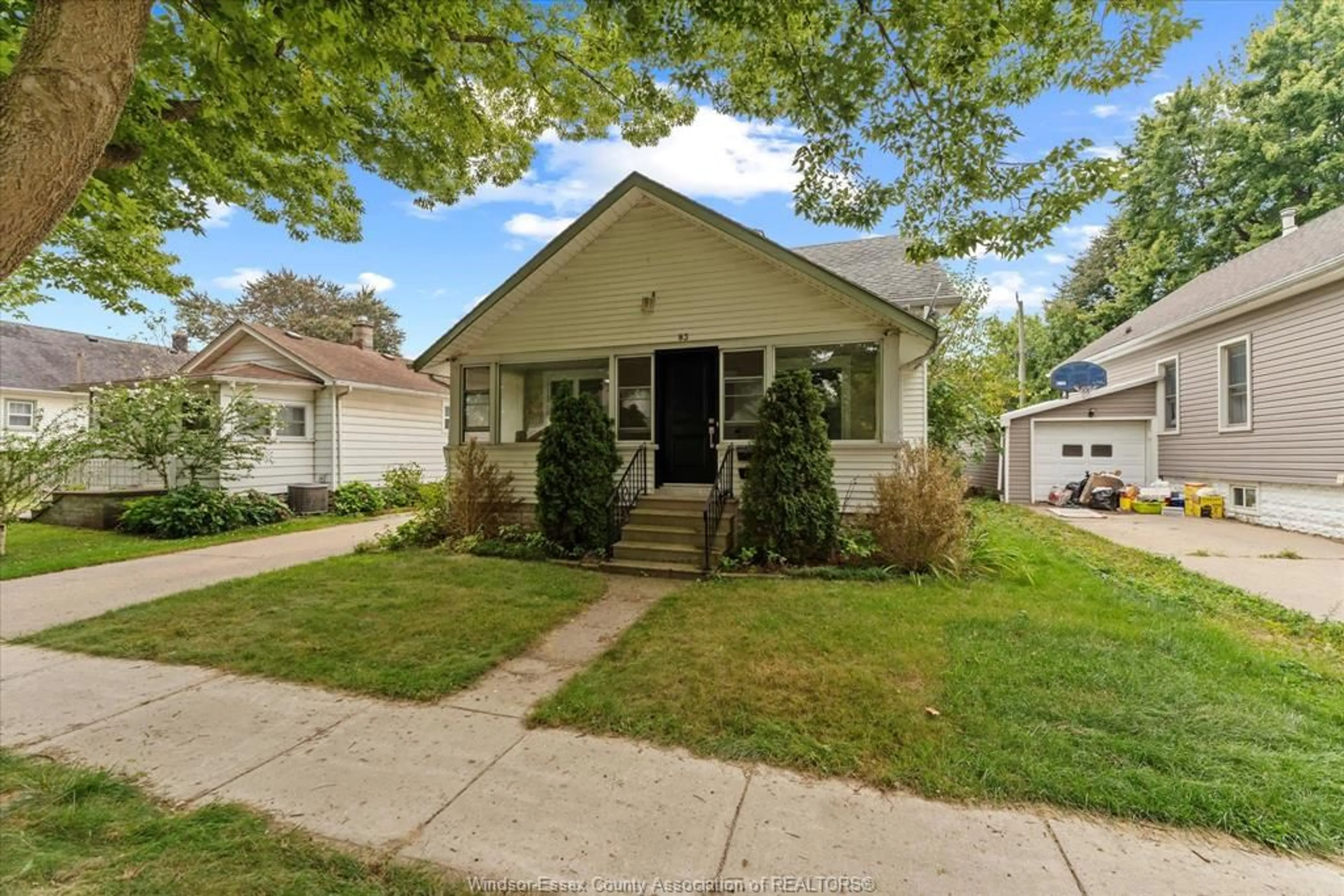 Home with vinyl exterior material, street for 83 WIGLE St, Leamington Ontario N8H 2T3