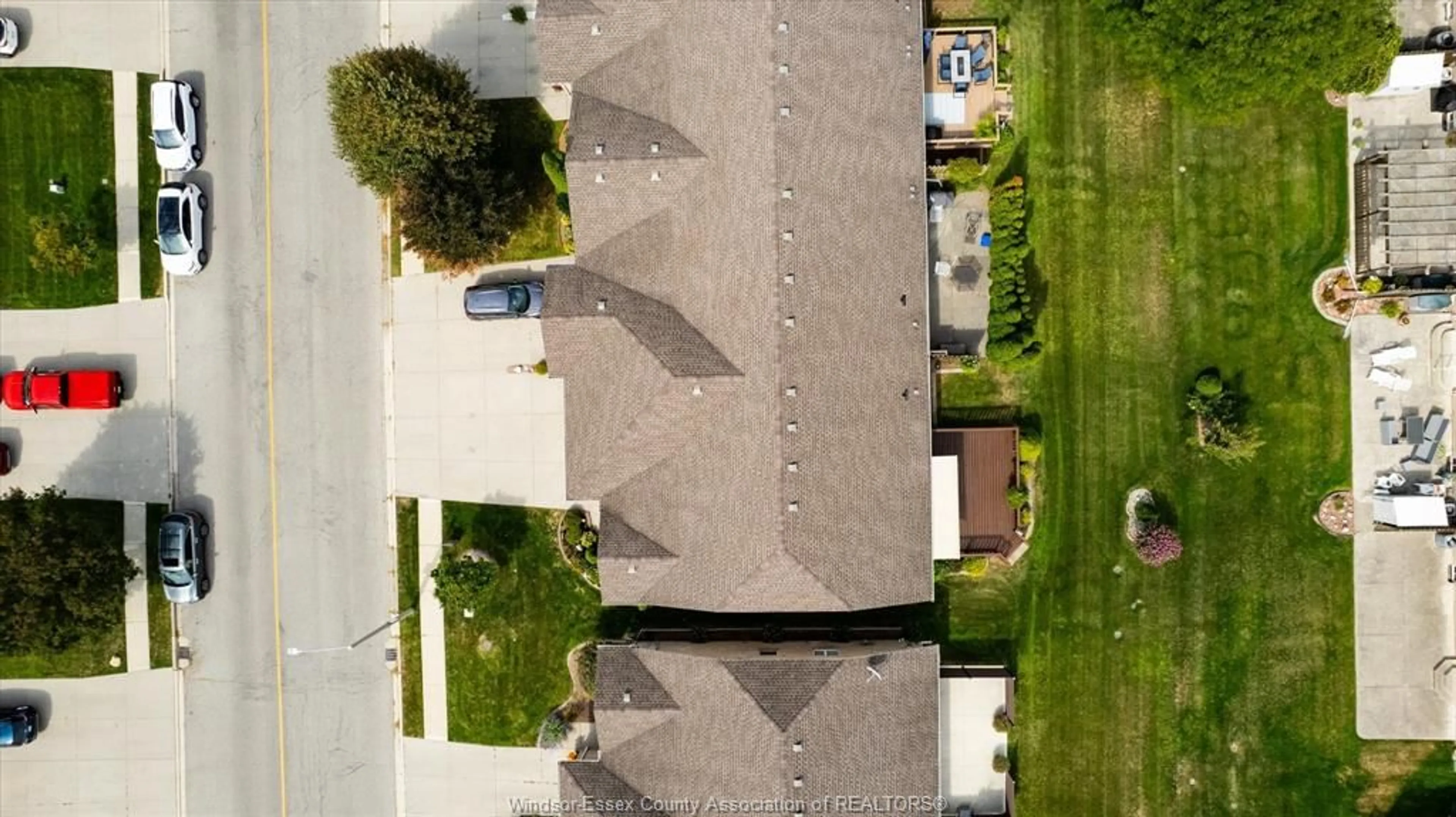 A pic from outside/outdoor area/front of a property/back of a property/a pic from drone, street for 1770 CLOVER, Windsor Ontario N8P 1W6